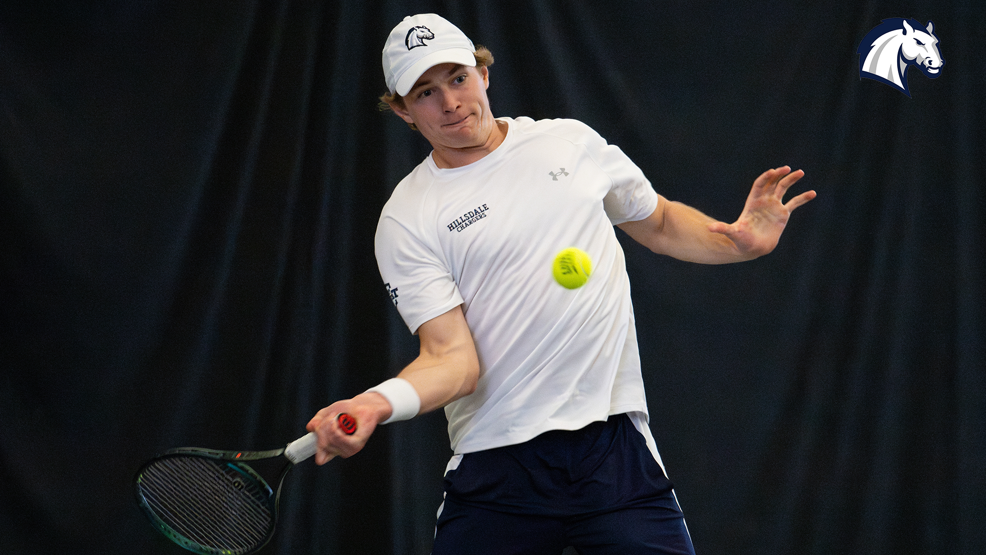 Hillsdale's Ellis Klanduch lines up a return shot against Northwood in April of 2025.