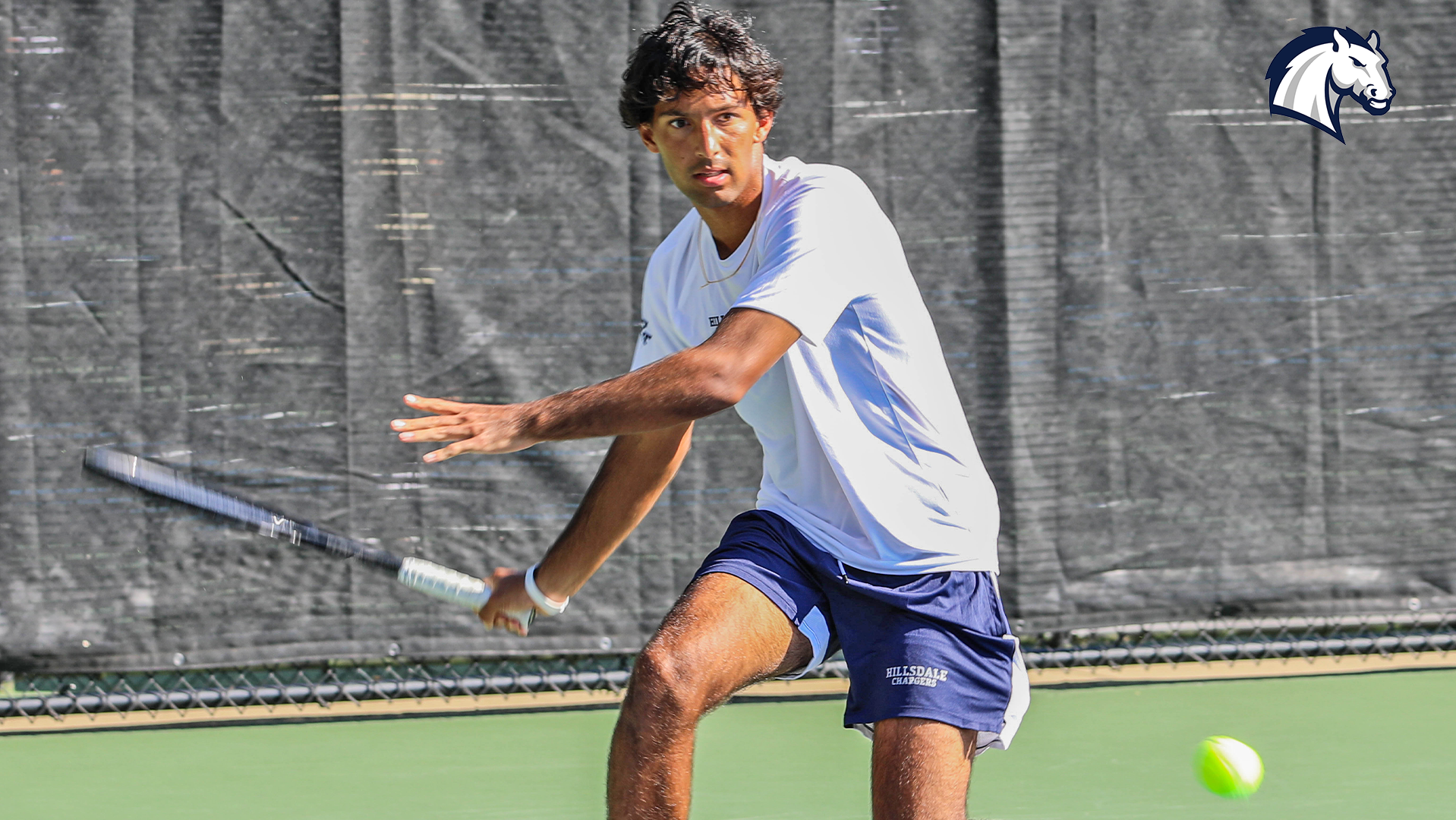 Hillsdale's Jackson Clements prepares to hit a forehand return during the Chargers' home summer tennis invitational in September 2025.
