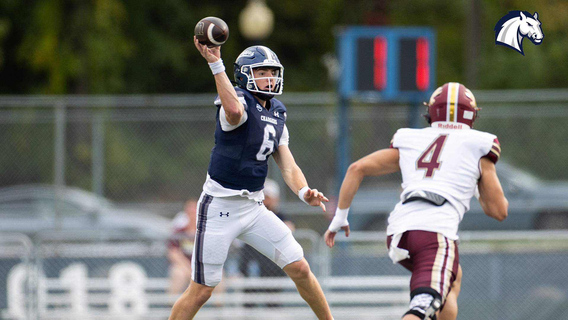 Hillsdale's Eli Boyce throws a pass on the move in a victory over Walsh on Oct. 10, 2026.