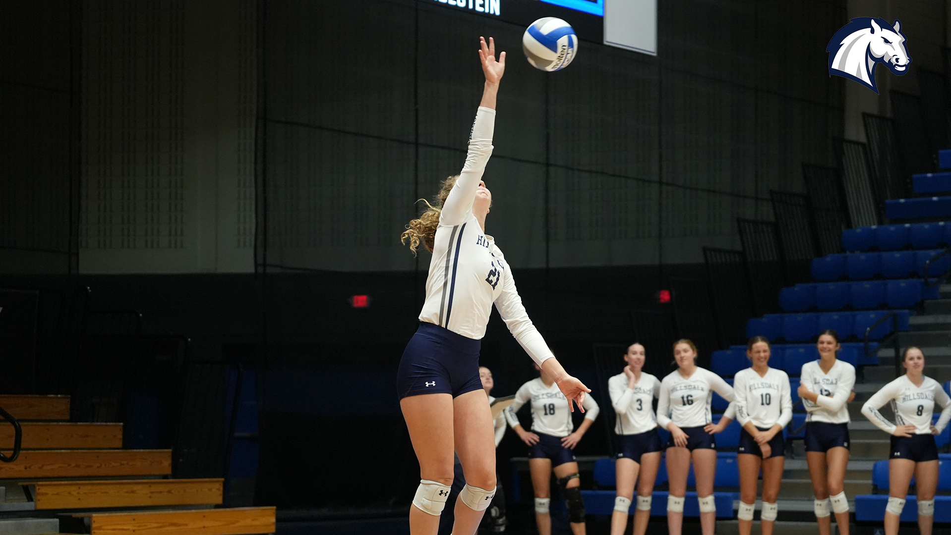 Hillsdale's Hannah Baker serves during a match at Grand Valley State on Oct. 9, 2026.