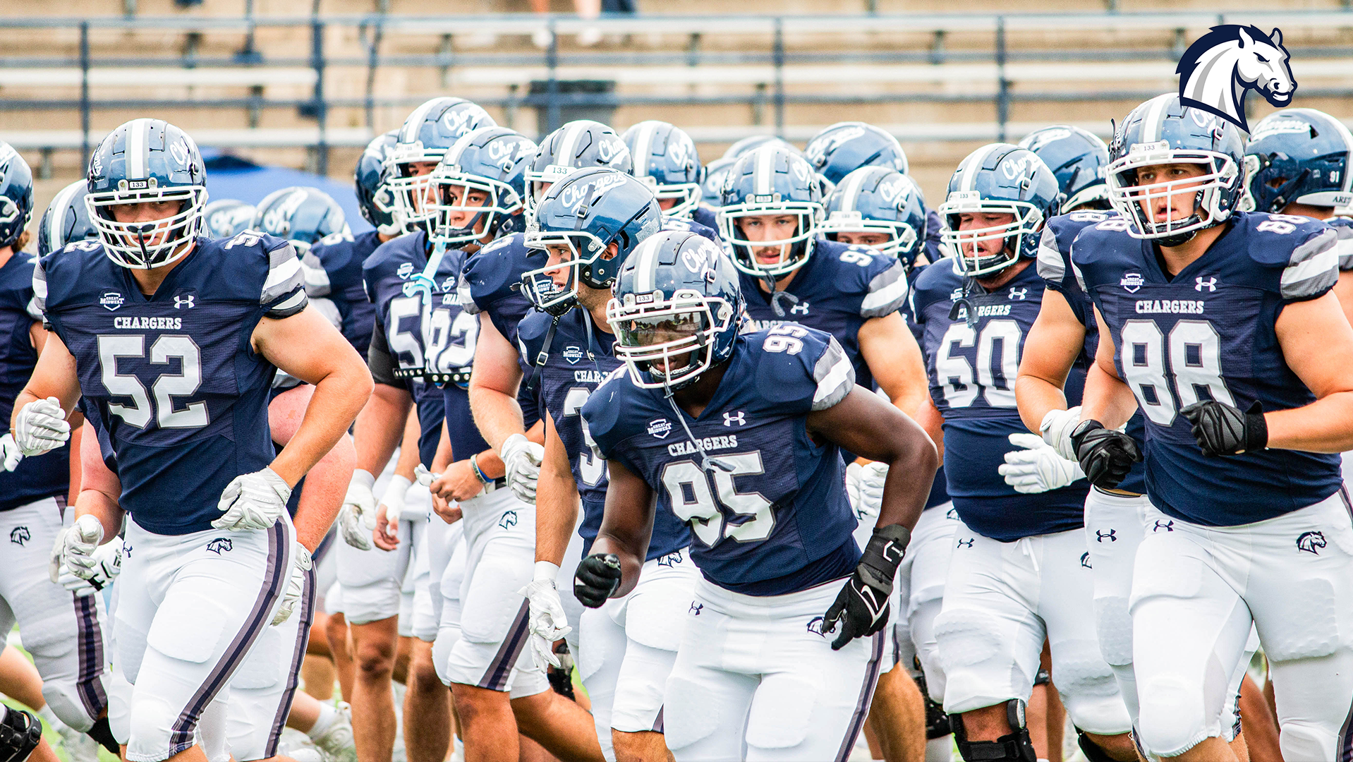 Hillsdale's football team takes the field against Michigan Tech on Sept. 13, 2025.