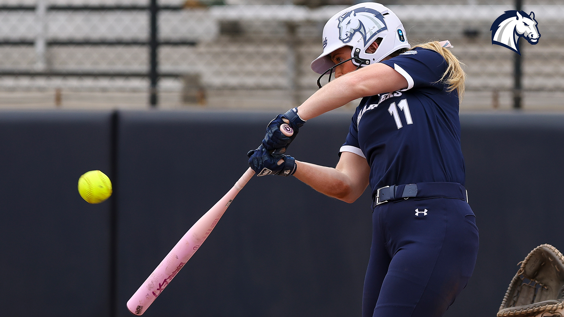 Hillsdale's Sydney Davis puts a ball in play against New Mexico Highlands on Feb. 8, 2026 in Tyler, Texas.