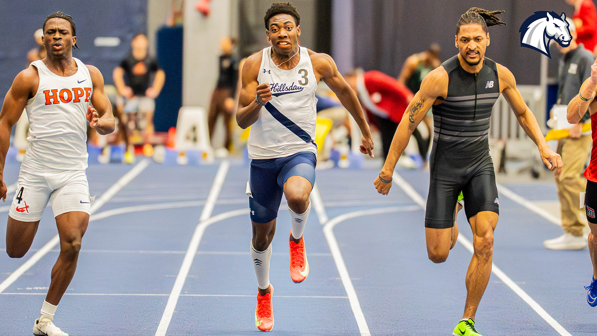 Hillsdale's Watson Magwenzi (center) races in the 60m dash at the Silverston Invitational on Feb. 20, 2026.
