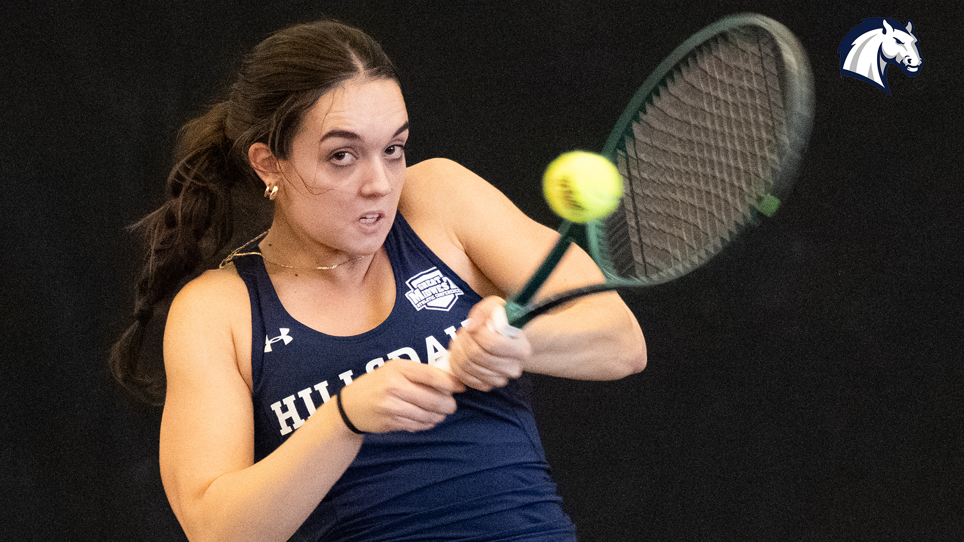 Hillsdale's Dimitra Papastavrou hits a return shot during a match against Goshen on Feb. 7, 2026.