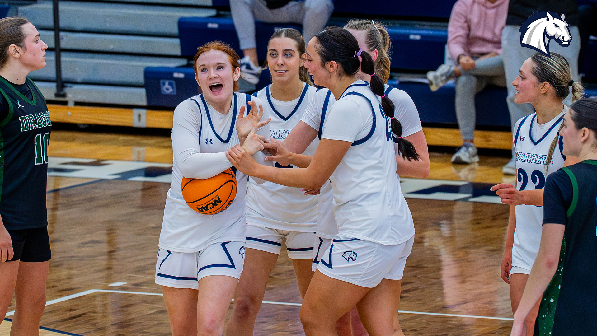 Hillsdale's players celebrate after a huge block late in the overtime period of a 76-73 win over Tiffin on Feb. 5, 2026.