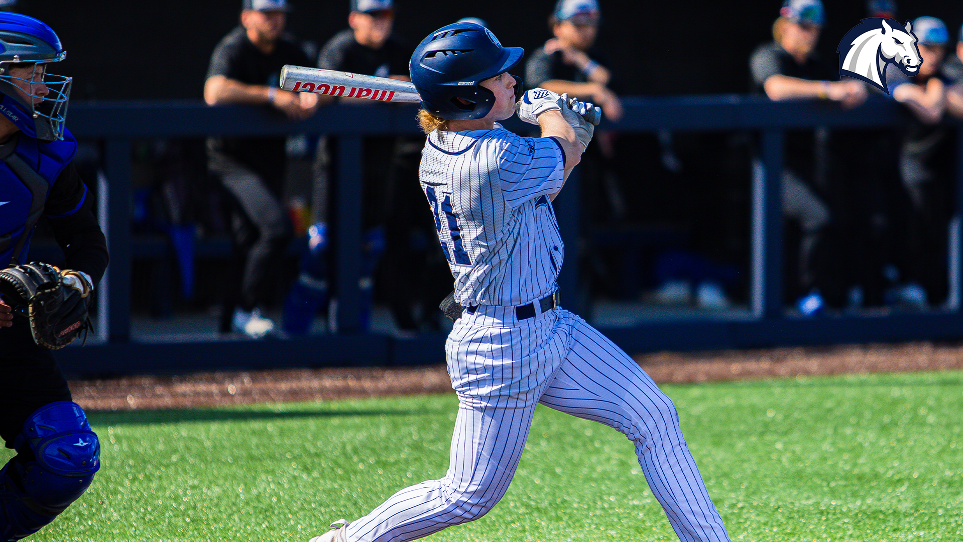 Hillsdale's Tyler Sowers puts the ball in play in a 2025 home contest against Thomas More.