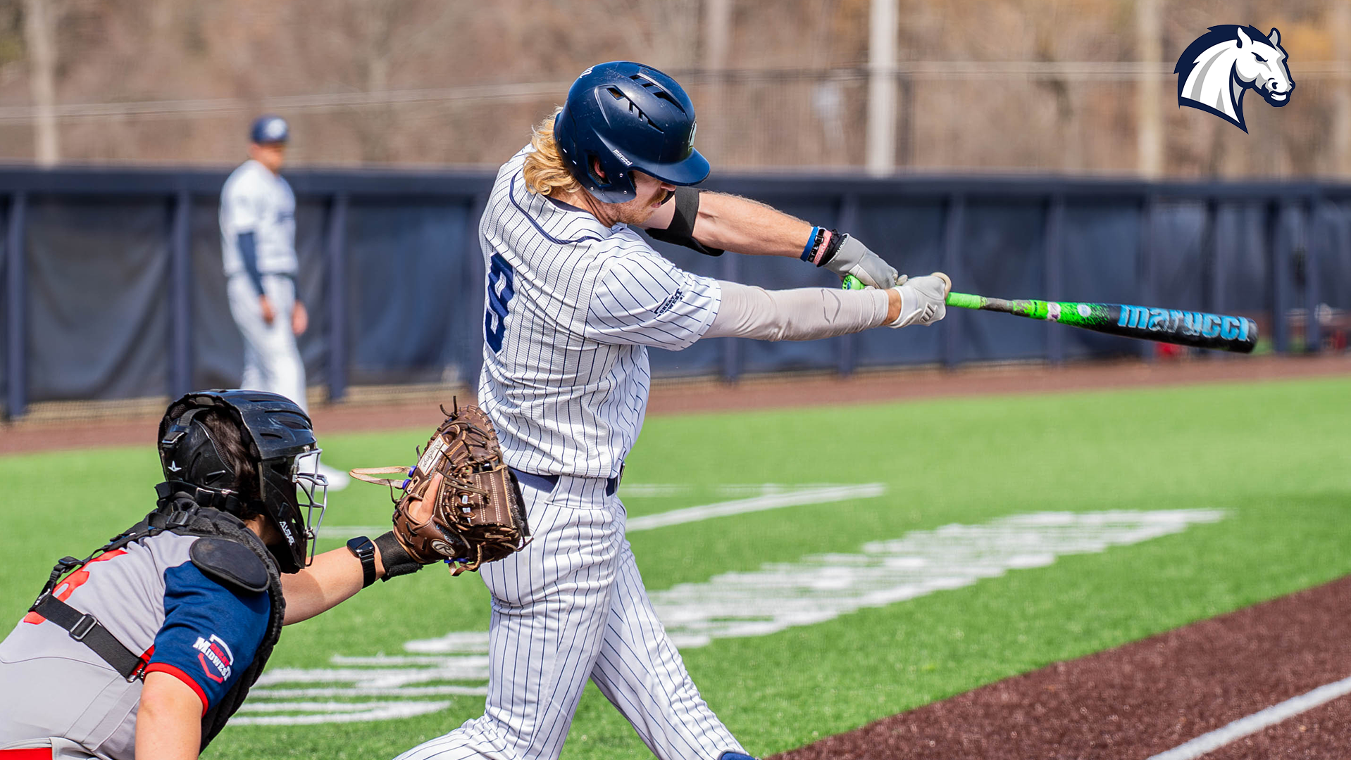 Hillsdale's Aaron Jasiak puts a ball in play during a Friday doubleheader against Malone.