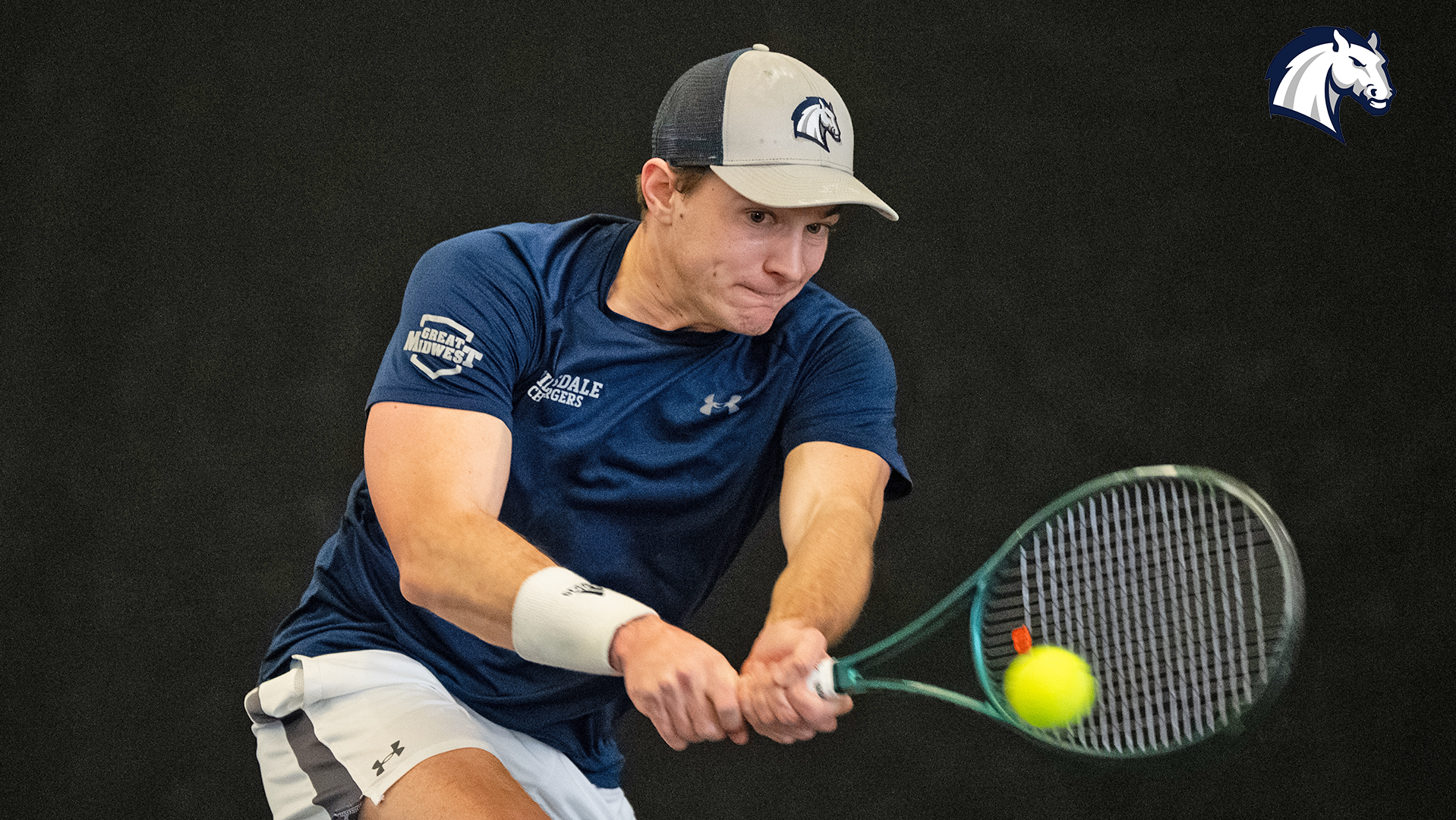 Hillsdale's Ellis Klanduch hits a return shot during a match against Goshen on Feb. 7, 2026.
