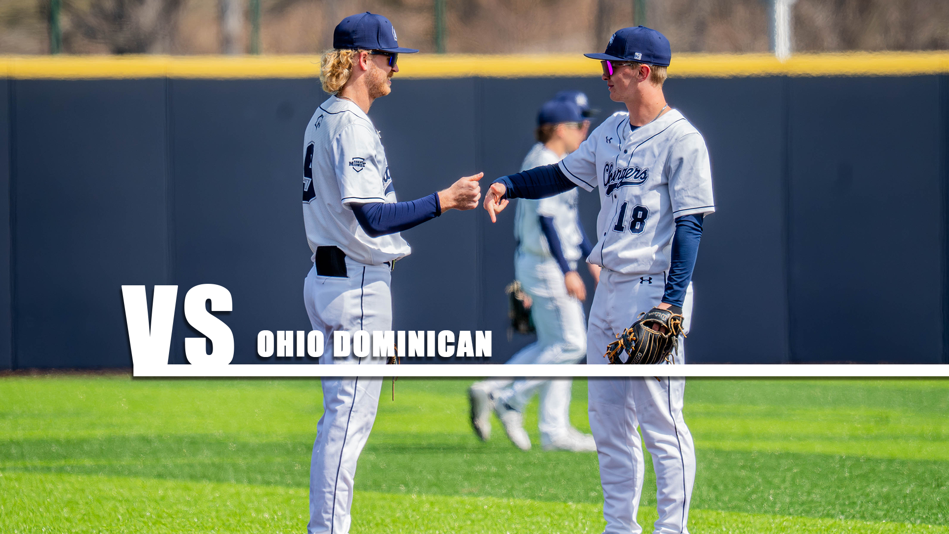 Chargers Aaron Jasiak (left) and Billy Porotsky confer between innings at second base against Malone on March 21, 2026.