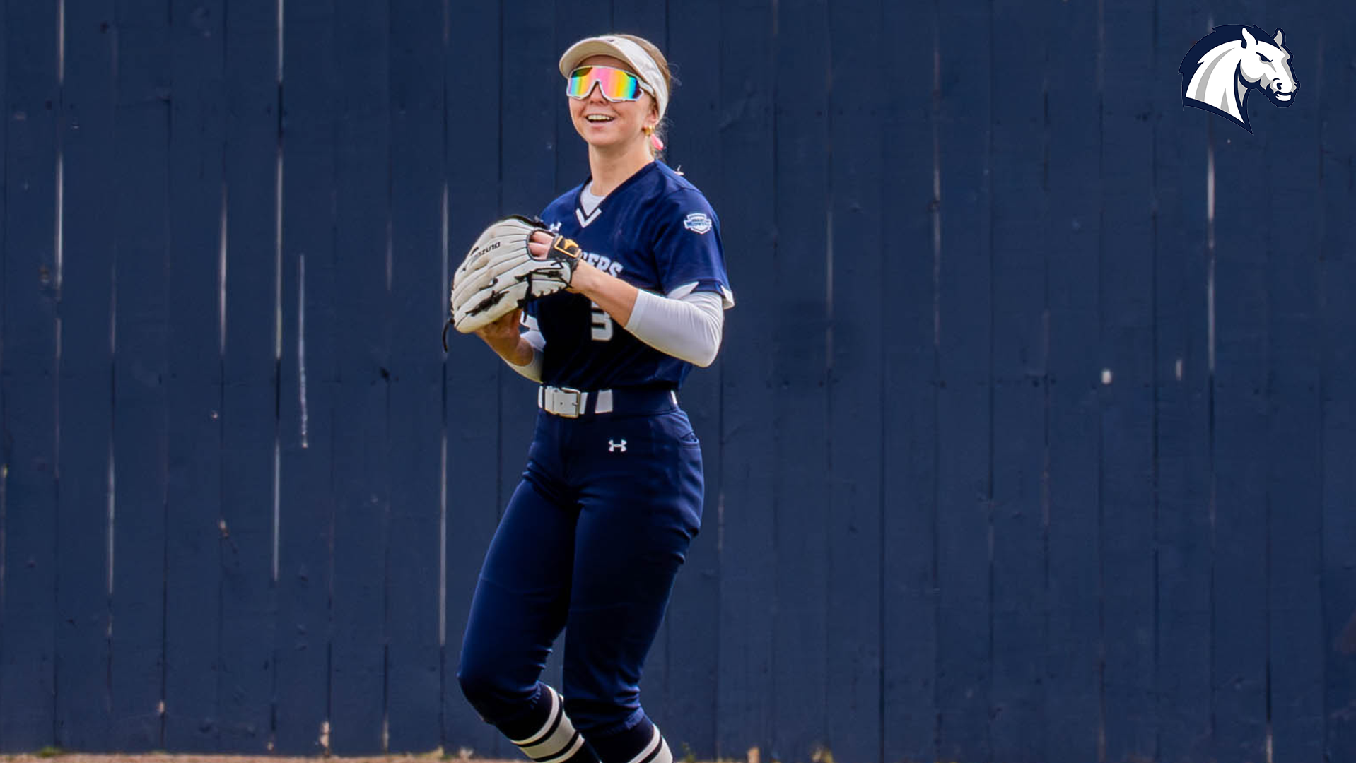 Hillsdale's Nathalie Hagle warms up in right field before a game against Lake Erie on March 22, 2026.