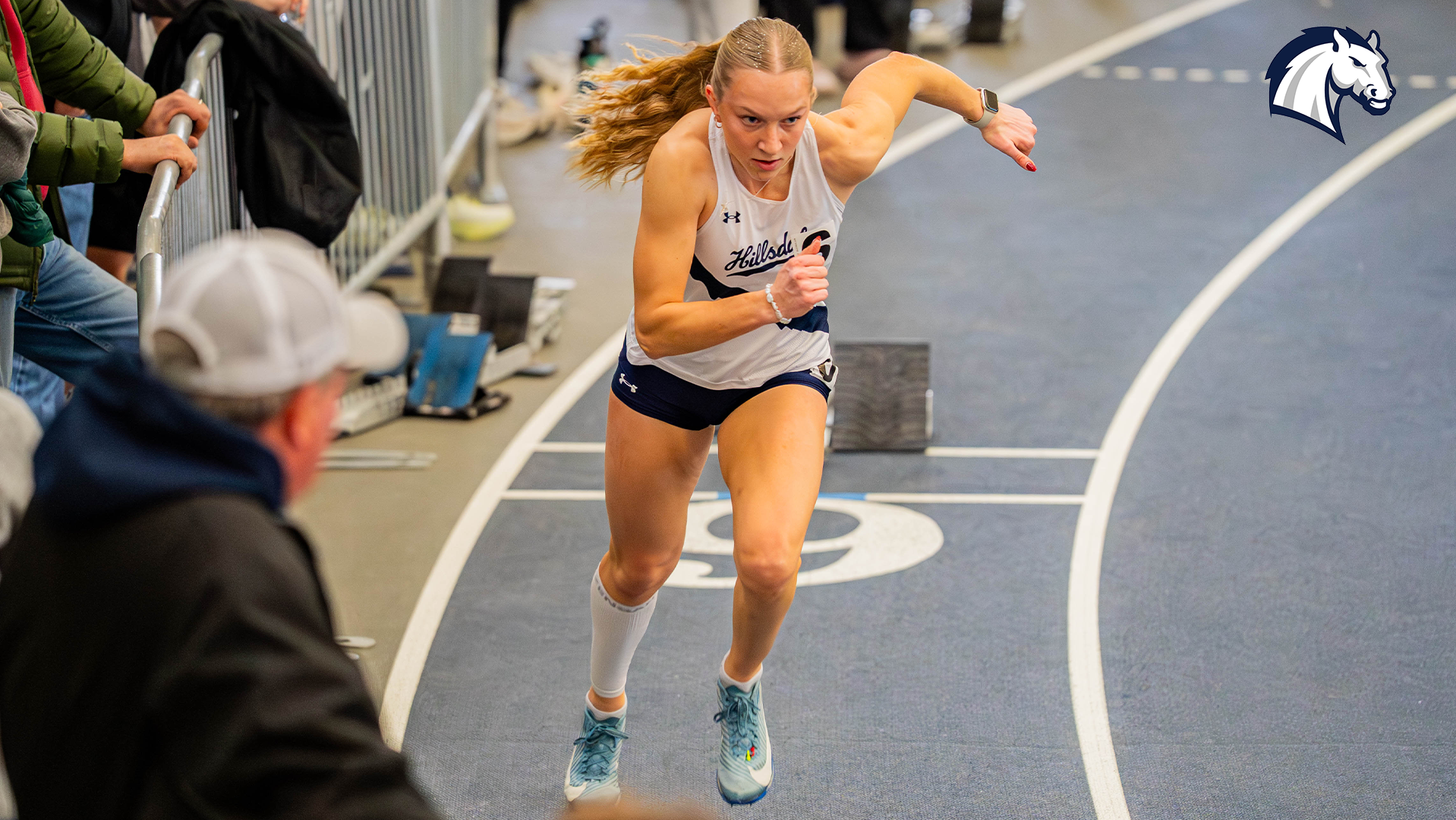 Hillsdale's Anna Roessner explodes out of the blocks in an indoor meet at Akron on Jan. 16, 2026.