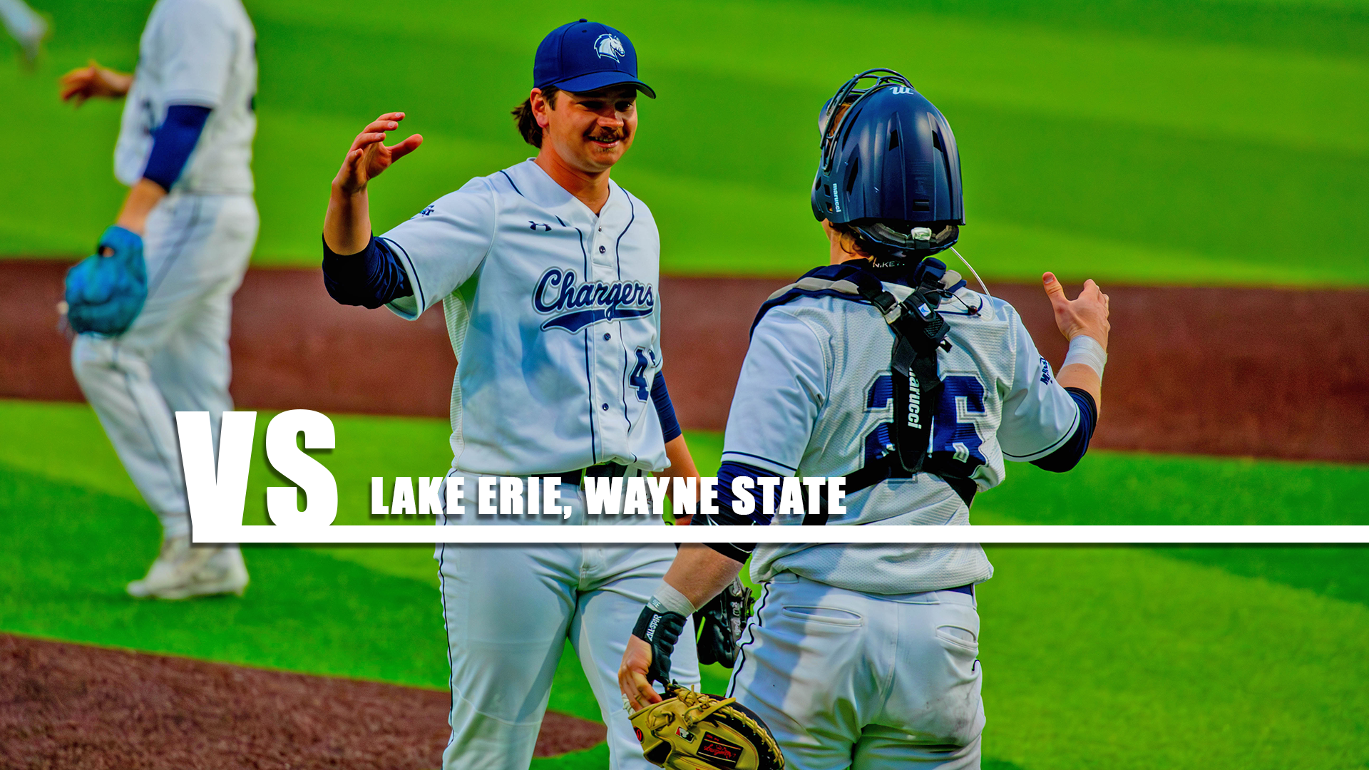 Winston Delp (47) and Ryan Wiehe (26) congratulate each other after securing the victory over Davenport on April 1, 2026.