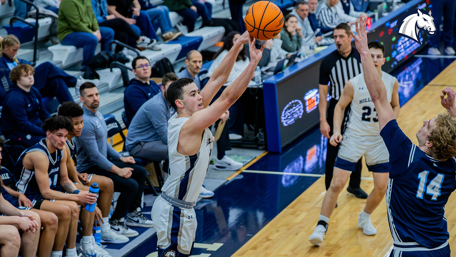 Hillsdale's Cole McWhinnie shoots a 3-pointer from the corner against Northwood on Feb. 28, 2026.