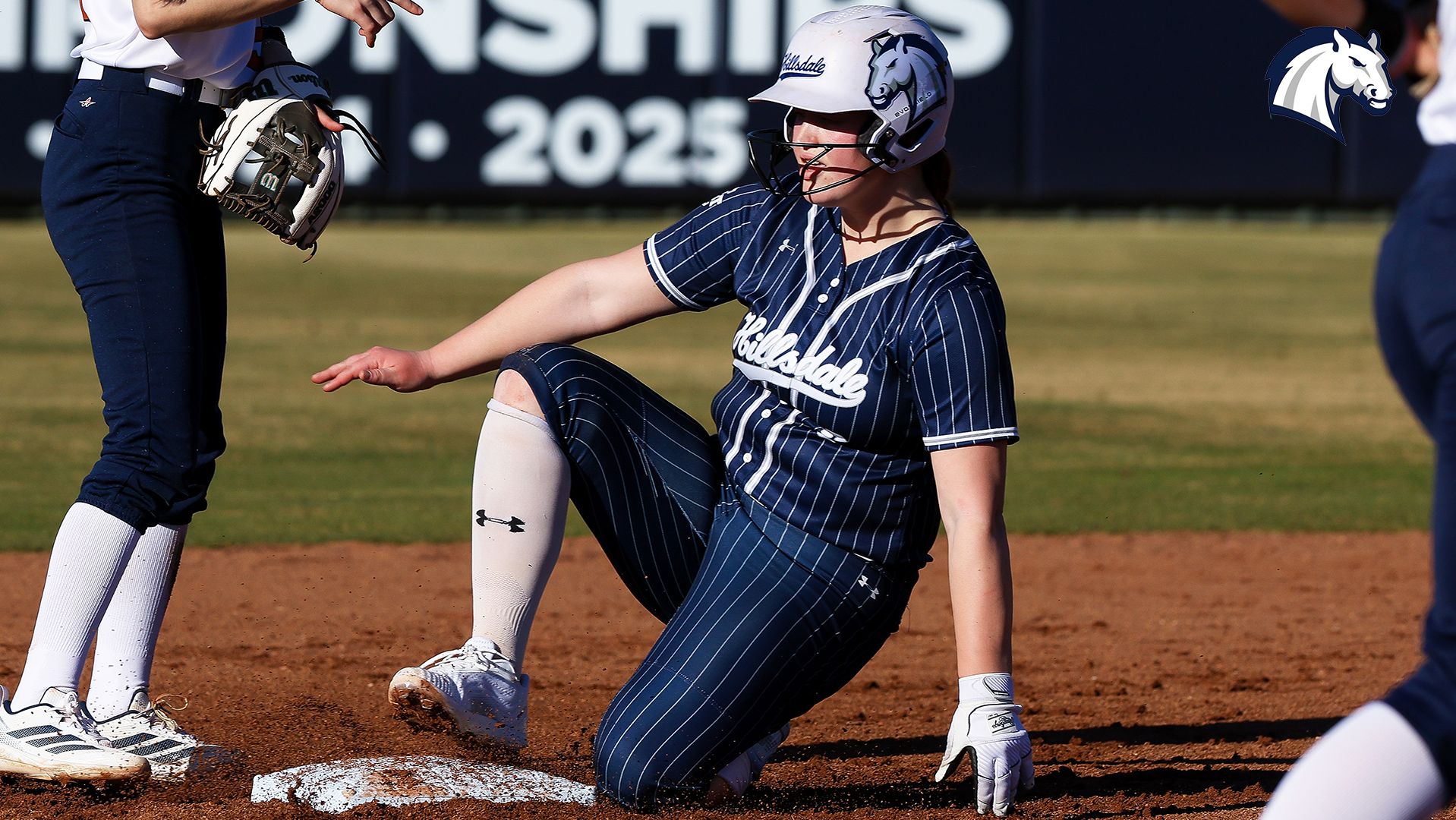 Hillsdale's Anna Chellman slides safely into second base during a Feb. 6 contest against Texas-Tyler.