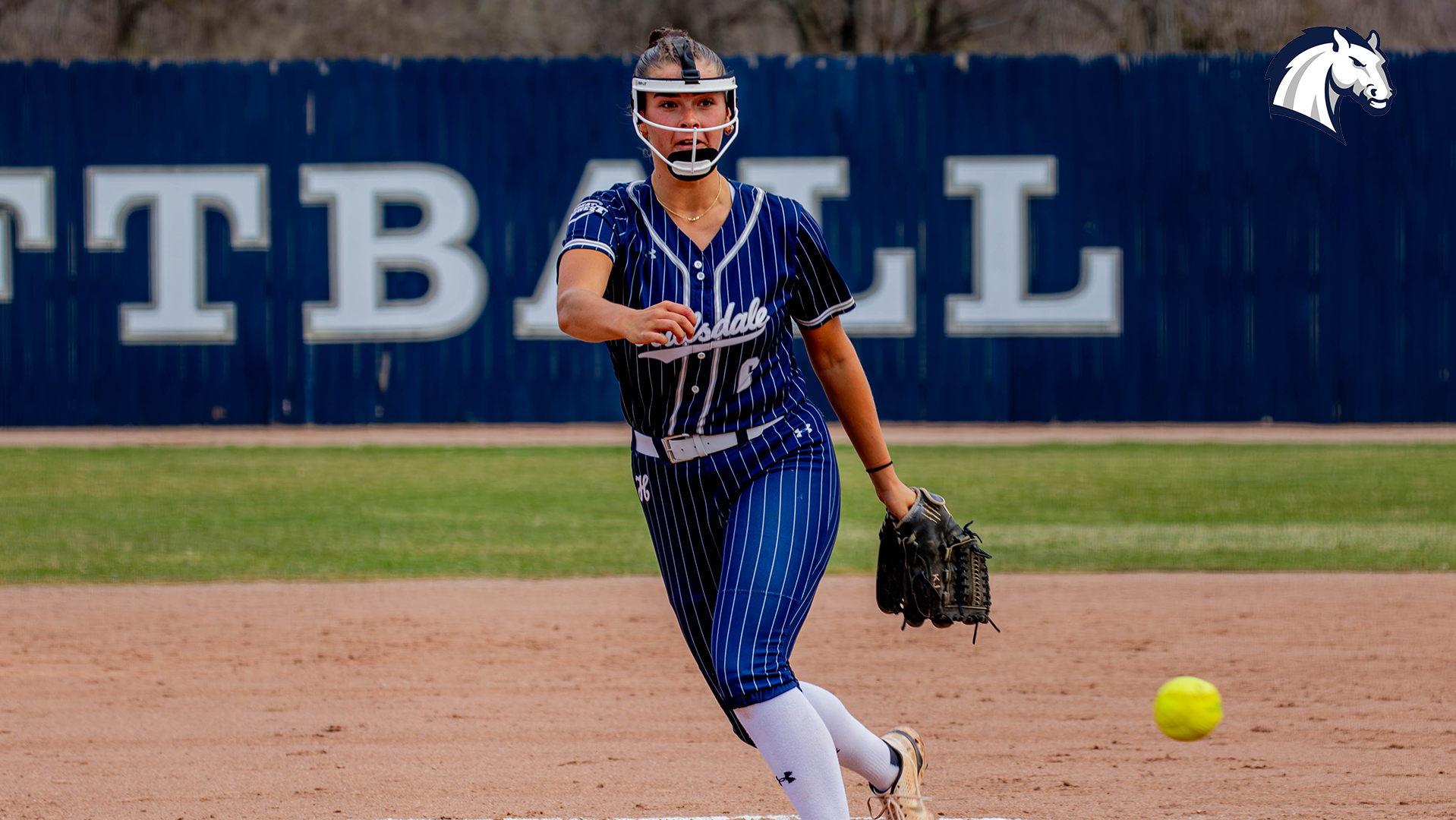 Hillsdale's Katie Jonas delivers a pitch against Cedarville on March 30, 2026.