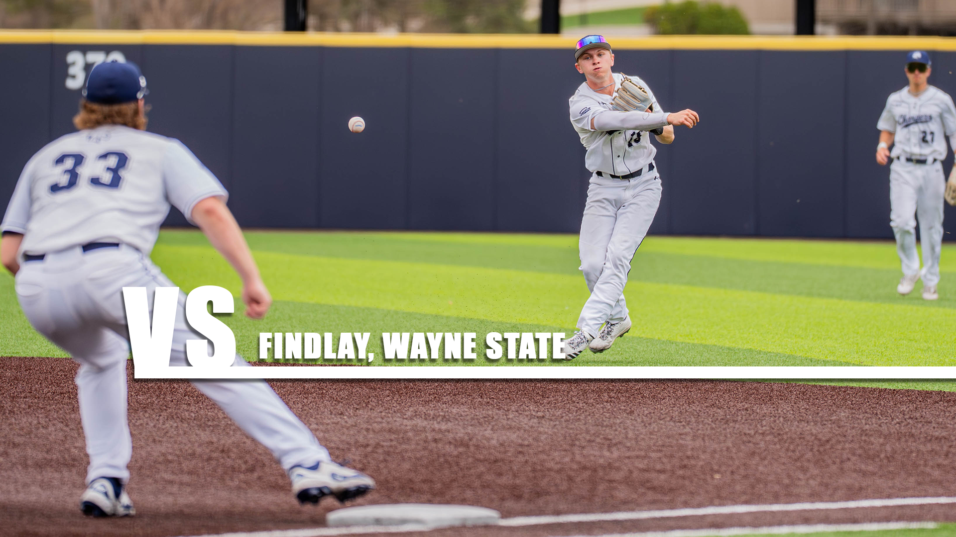 Hillsdale second baseman Billy Porotsky makes a tough throw to first for an out against Wayne St. on April 14, 2026.