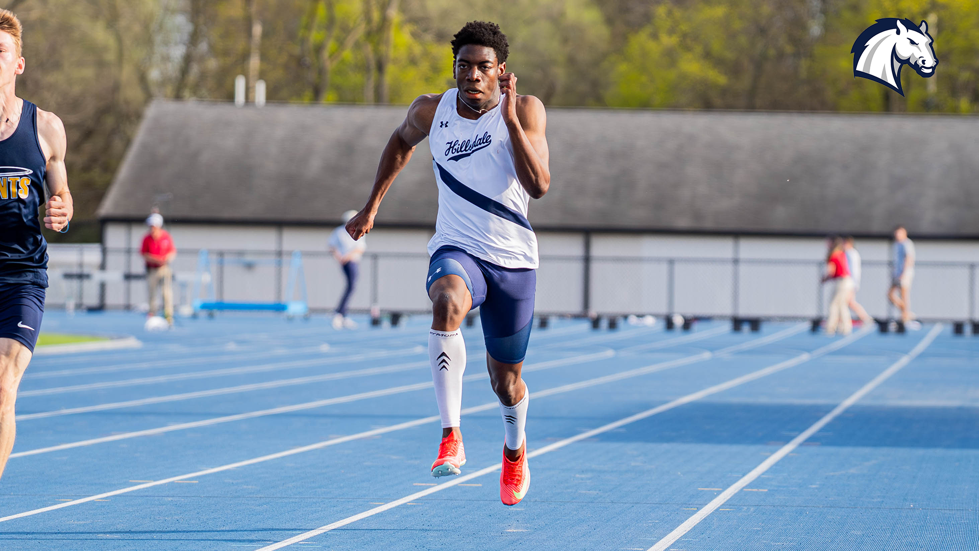 Hillsdale's Watson Magwenzi races for the finish line in the 100m dash at the 2026 edition of the GINA Relays on April 17.