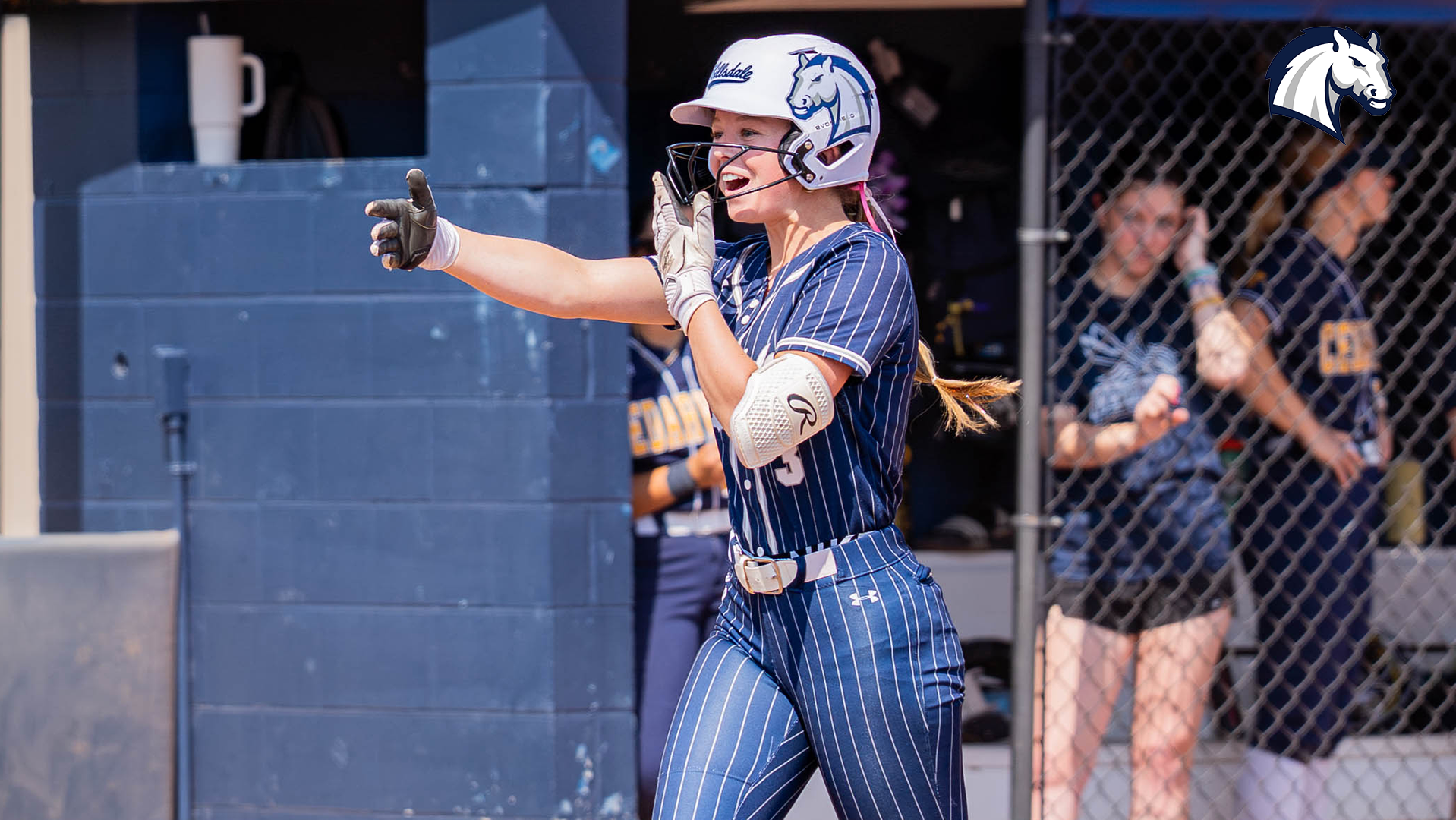 Natalie Hagle celebrates as she heads home to score a run against Cedarville on March 30, 2026.