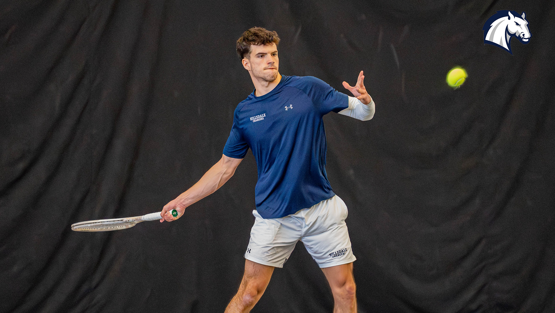 Hillsdale's Alex Cordero Lopez hits a return shot against Tiffin on March 28, 2026.