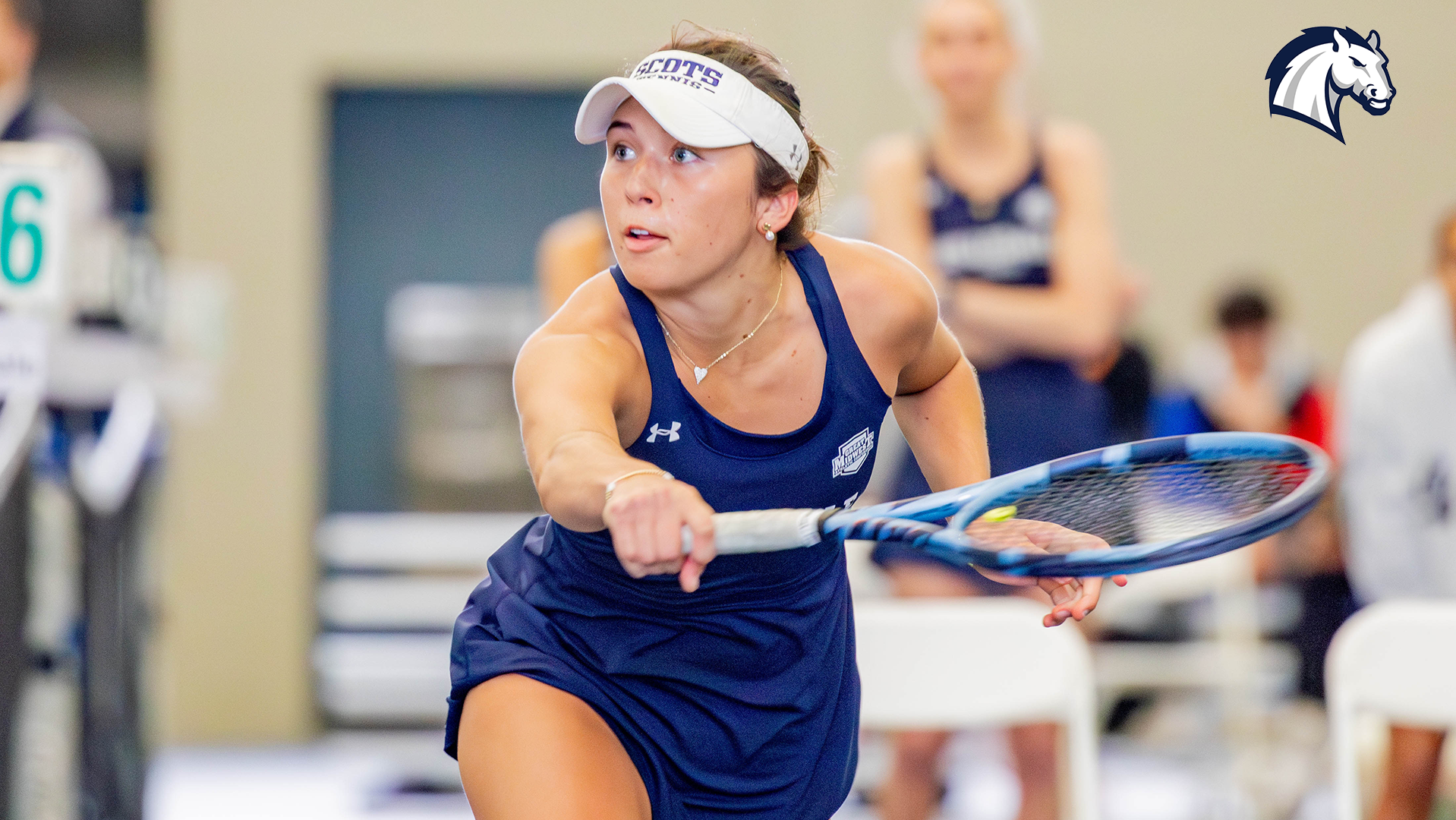 Hillsdale's Briana Rees tracks a ball at the net during doubles play against Findlay on March 27, 2026.