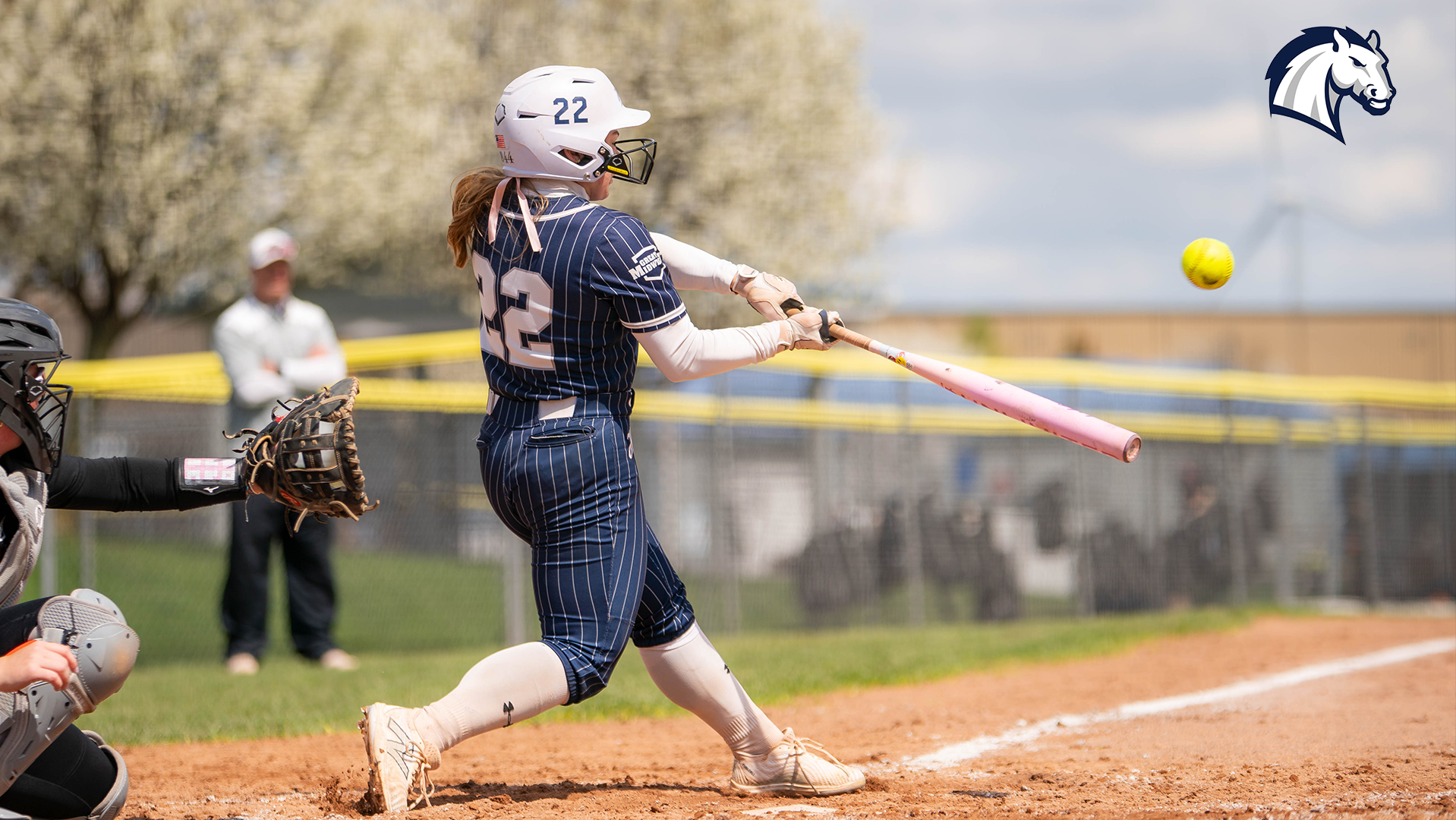 Hillsdale's Taylor Lewis hits a fly ball during a contest at Findlay on April 6, 2026.