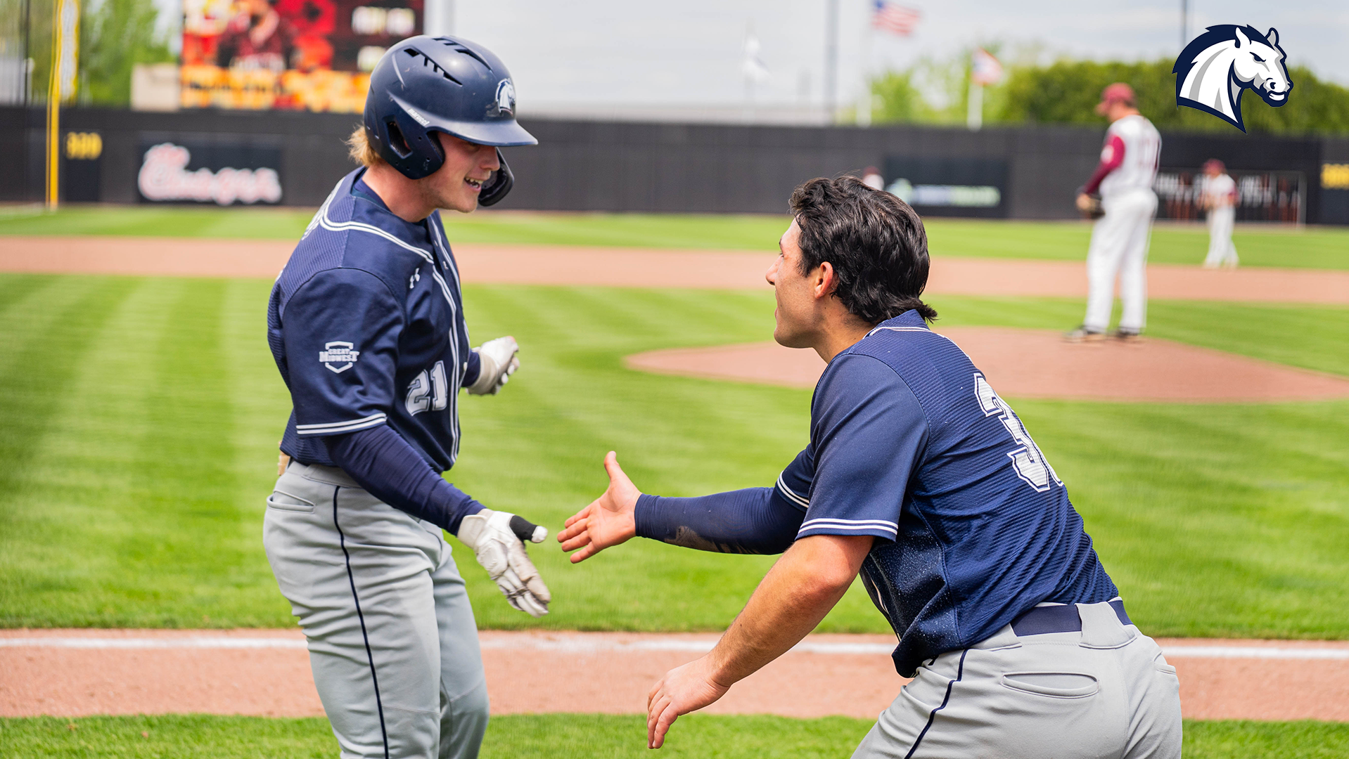 Tyler Sowers (left) and Rocco Tenuta celebrate after a home run in the G-MAC Tourney against Walsh in May 2026.