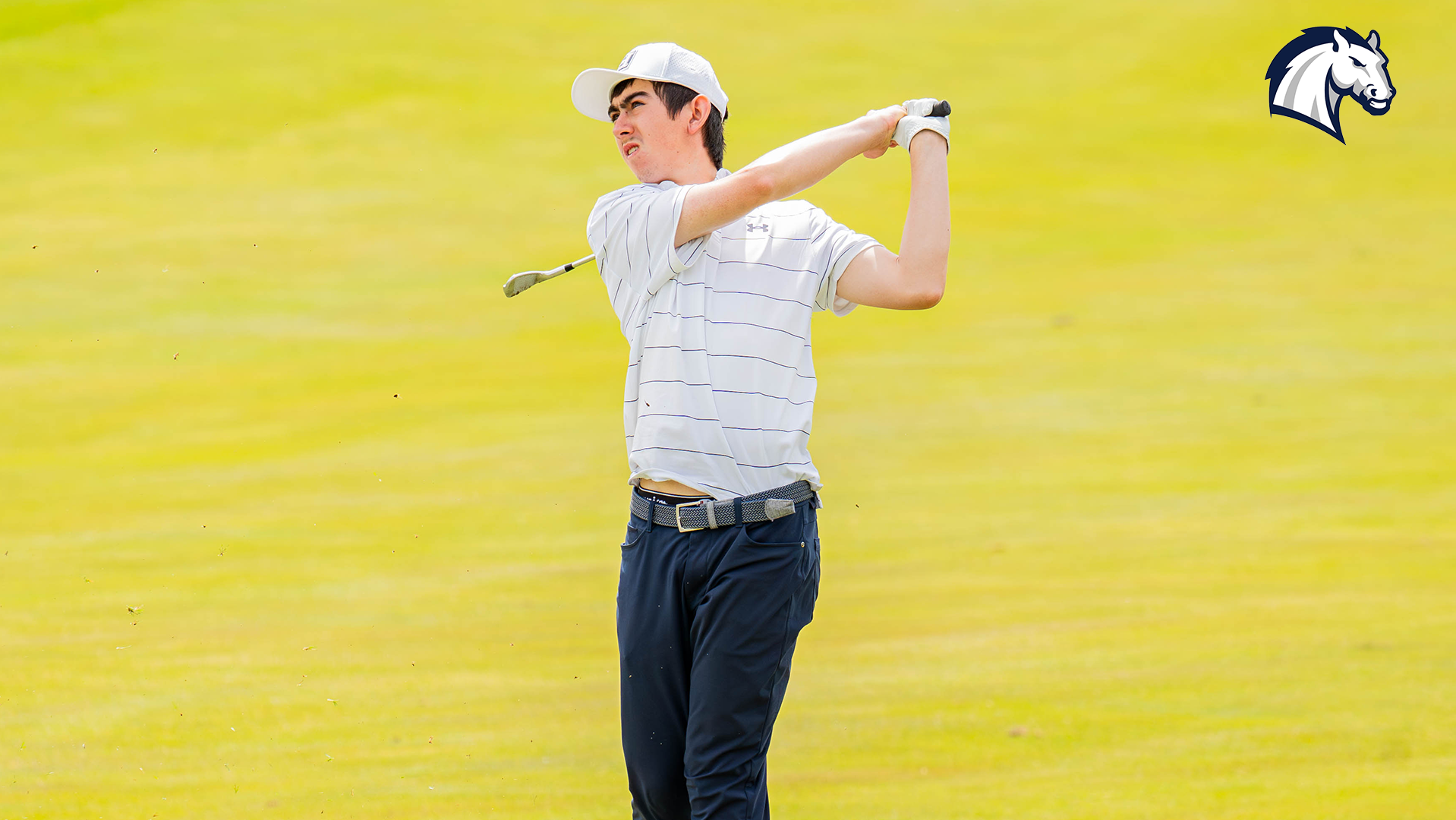 Hillsdale's Robert Thompson hits an approach shot during the 2026 G-MAC Championships on April 20.