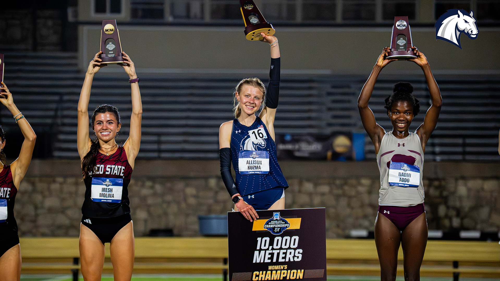 Hillsdale's Allison Kuzma poses with her national championship trophy after winning the 10,000m run at the 2026 NCAA DII Outdoor Championships on May 21 in Emporia, Kansas.