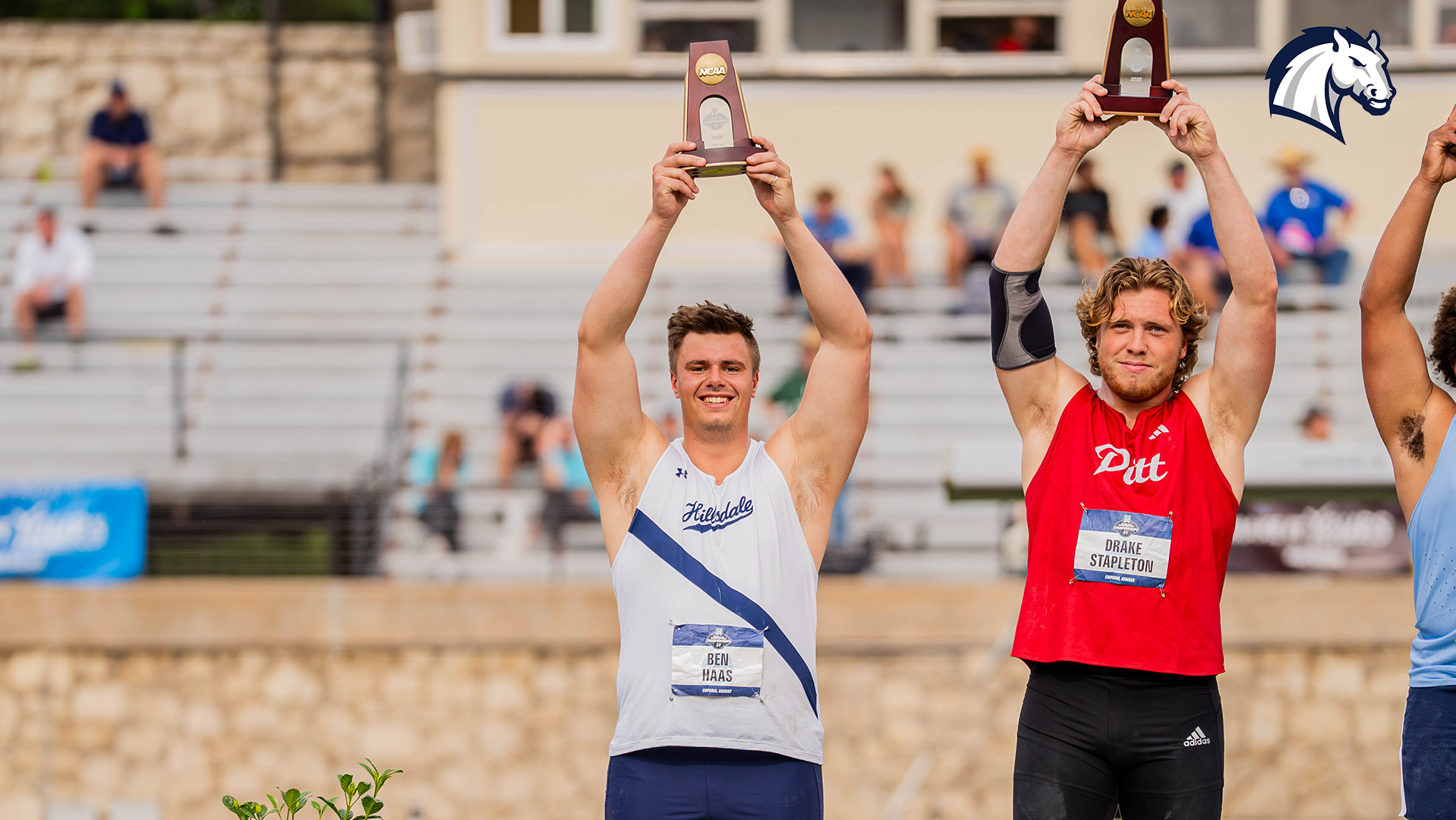 Hillsdale's Ben Haas holds up his All-American trophy after taking seventh in the shot put at the 2026 NCAA DII Outdoor Championships.