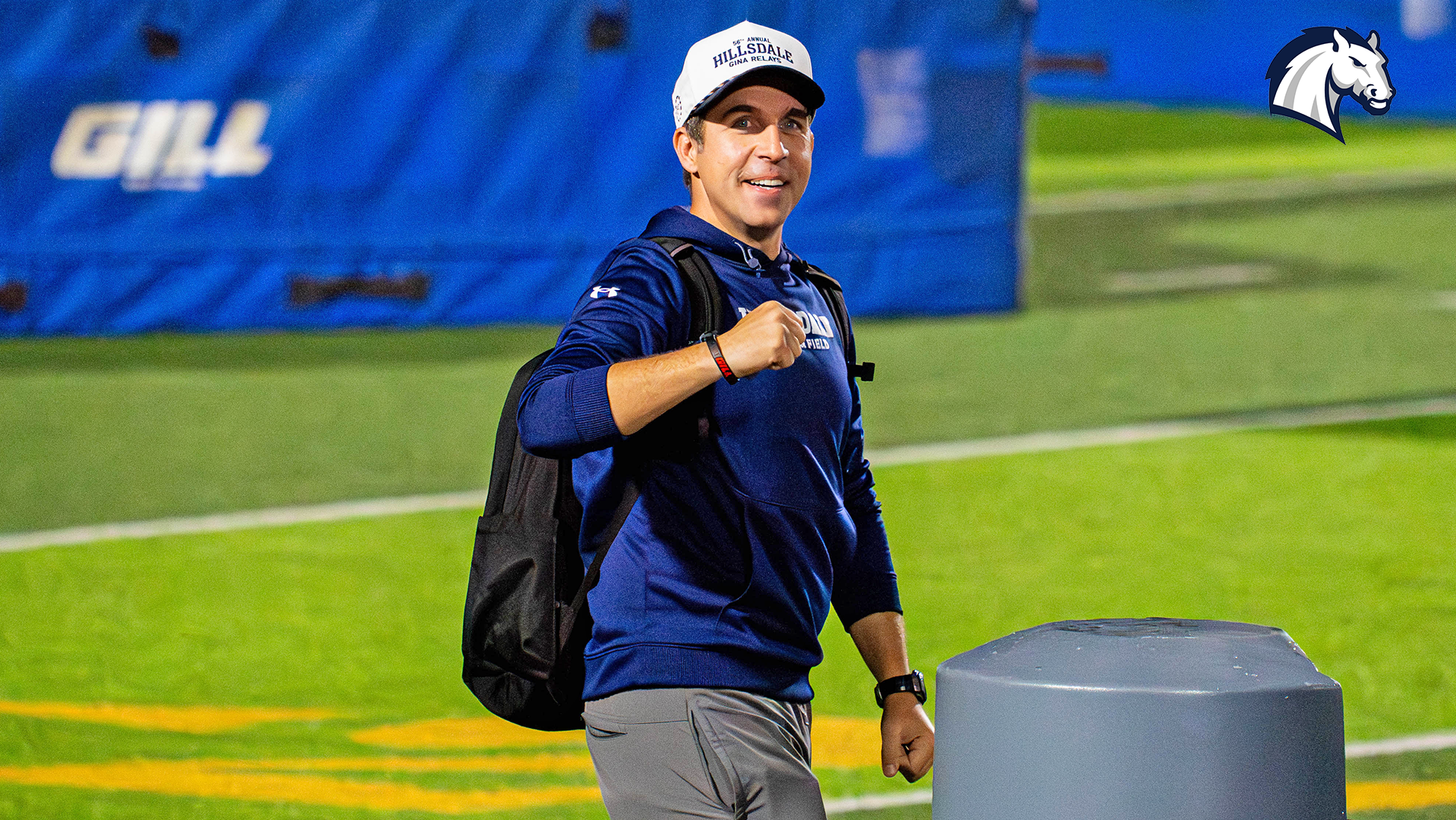 Hillsdale track coach R.P. White celebrates after Allison Kuzma wins the 10,000m national title at the 2026 NCAA DII Outdoor Championships.