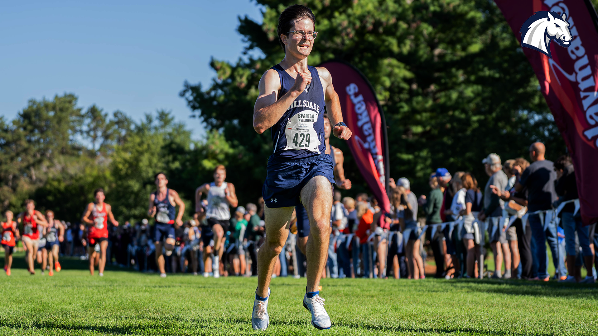 Hillsdale's John Richardson races down the home stretch toward the finish line at the 2026 Spartan Invitational on Sept. 11.