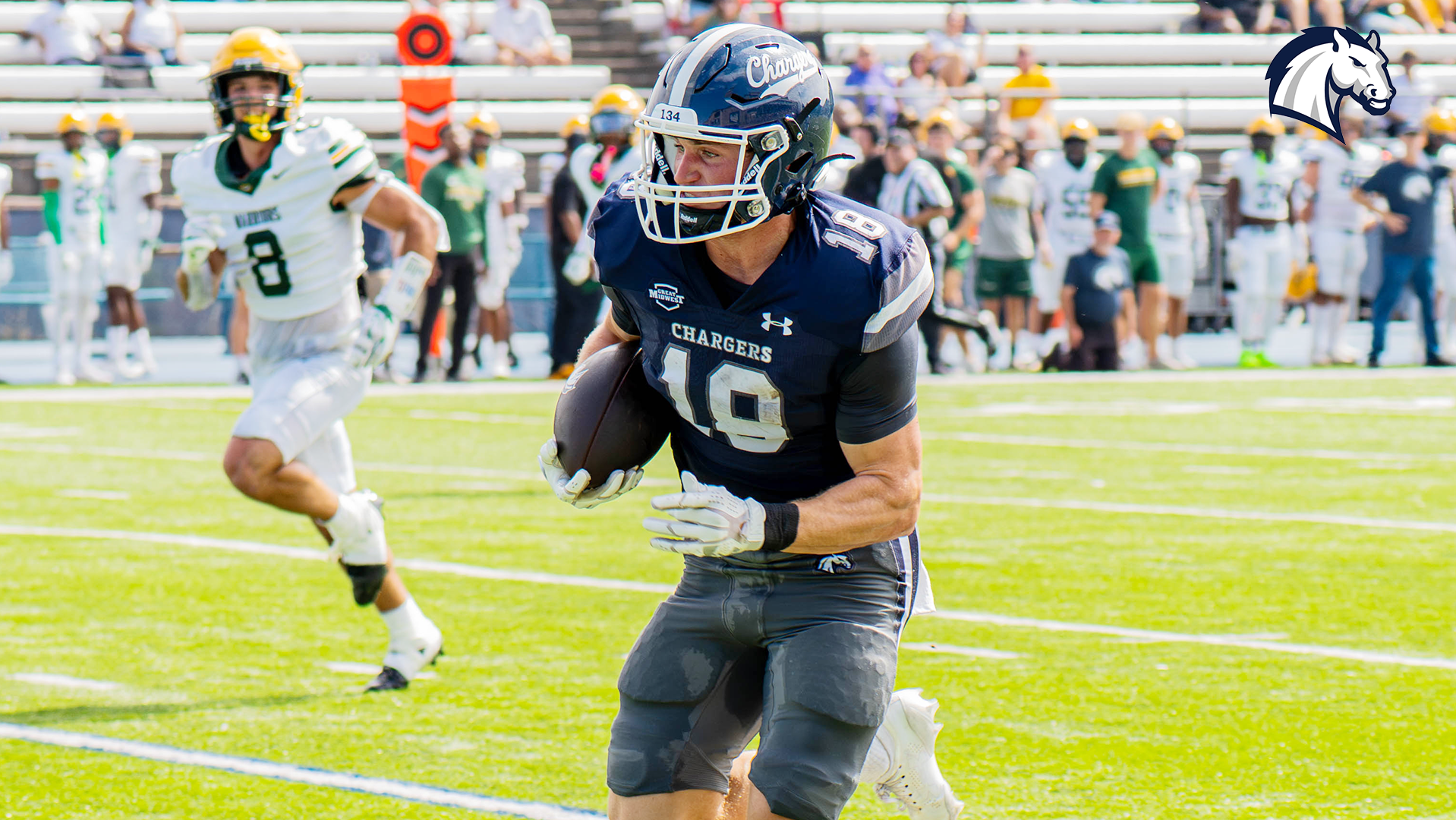 Hillsdale's Tutt Carrico races for the end zone after a catch against Wayne State on Sept. 12, 2026.