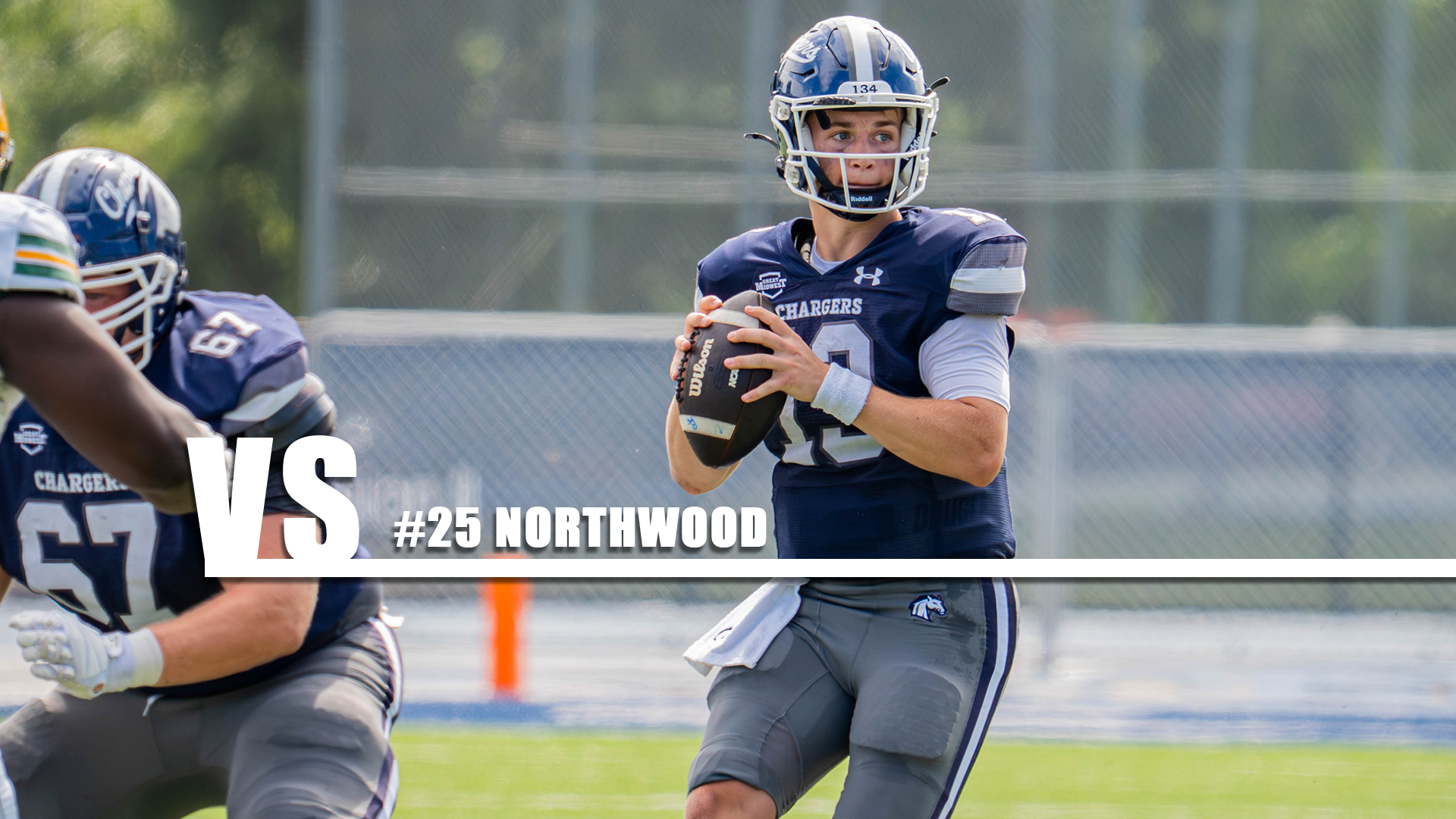 Quarterback Colin McKernan surveys the field on a passing attempt against Wayne State on Sept. 12, 2026.