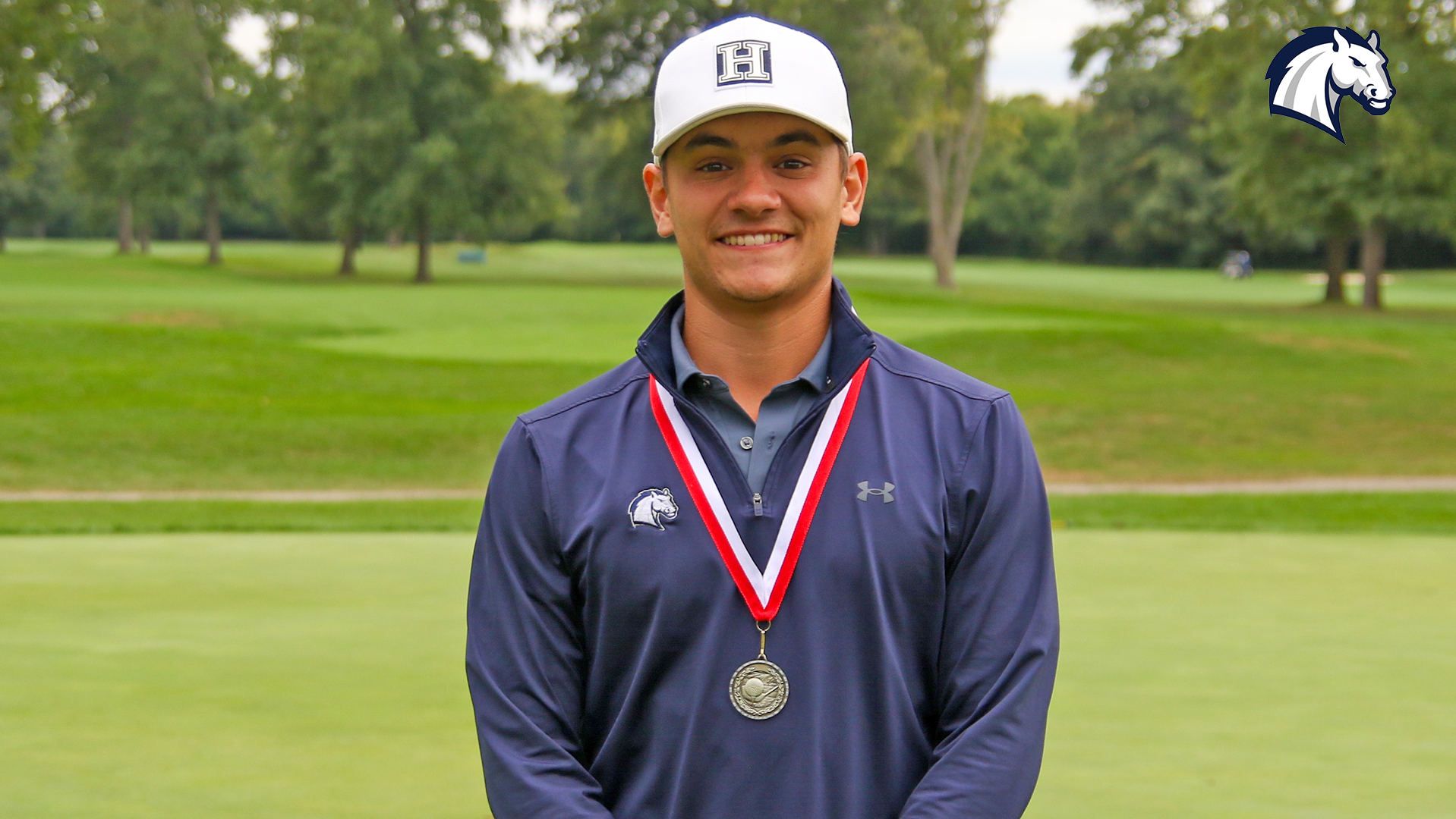 Hillsdale's Oliver Marshall poses with a medal won at the 2026 UIndy Invitational on Sept. 22, 2026.