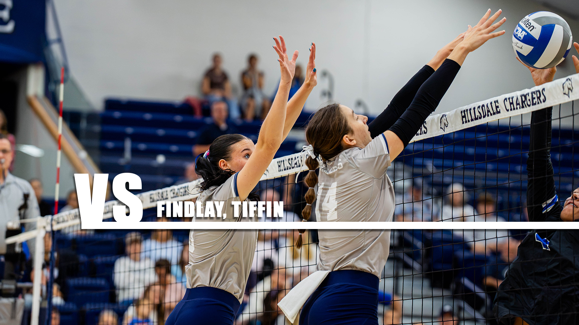 Hillsdale's Molly Kennedy and Grace Drake (right) go for a block against Thomas More on Sept. 26, 2026.