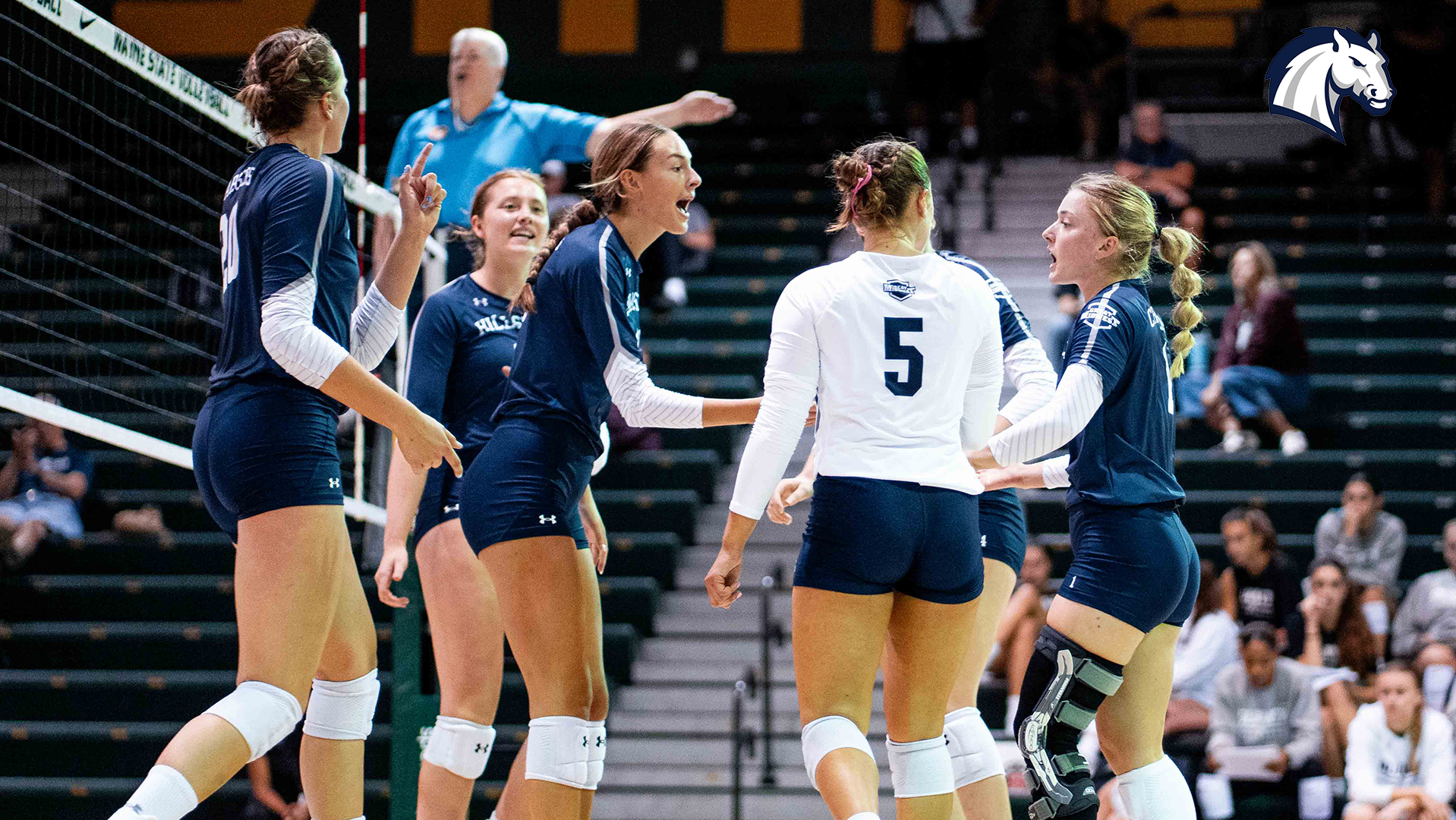 The Chargers celebrate after scoring a point against IUP in a volleyball match on August 28, 2026.