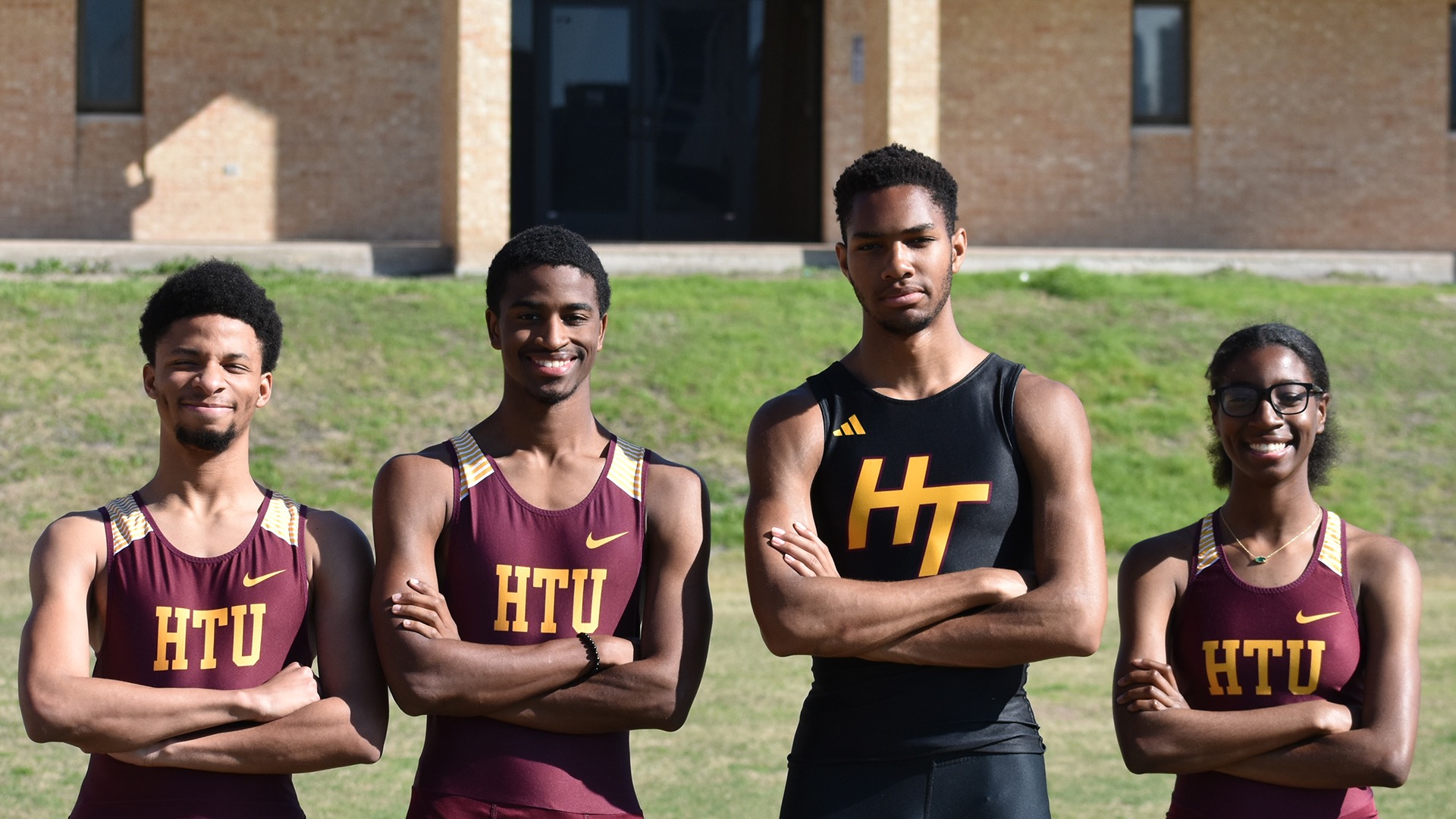Kamar Johnson, Adonis Chatman, Caleb Anthony, and Ayanna Johnson pose prior to their championship events