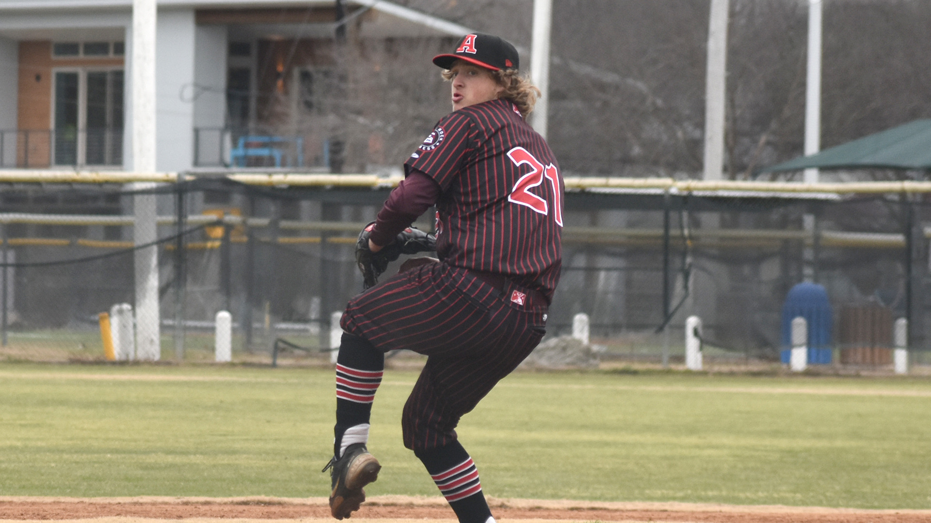 Rece Houghton winds up to pitch during HT's Saturday, Jan. 25 doubleheader against Central Christian (Kan.)
