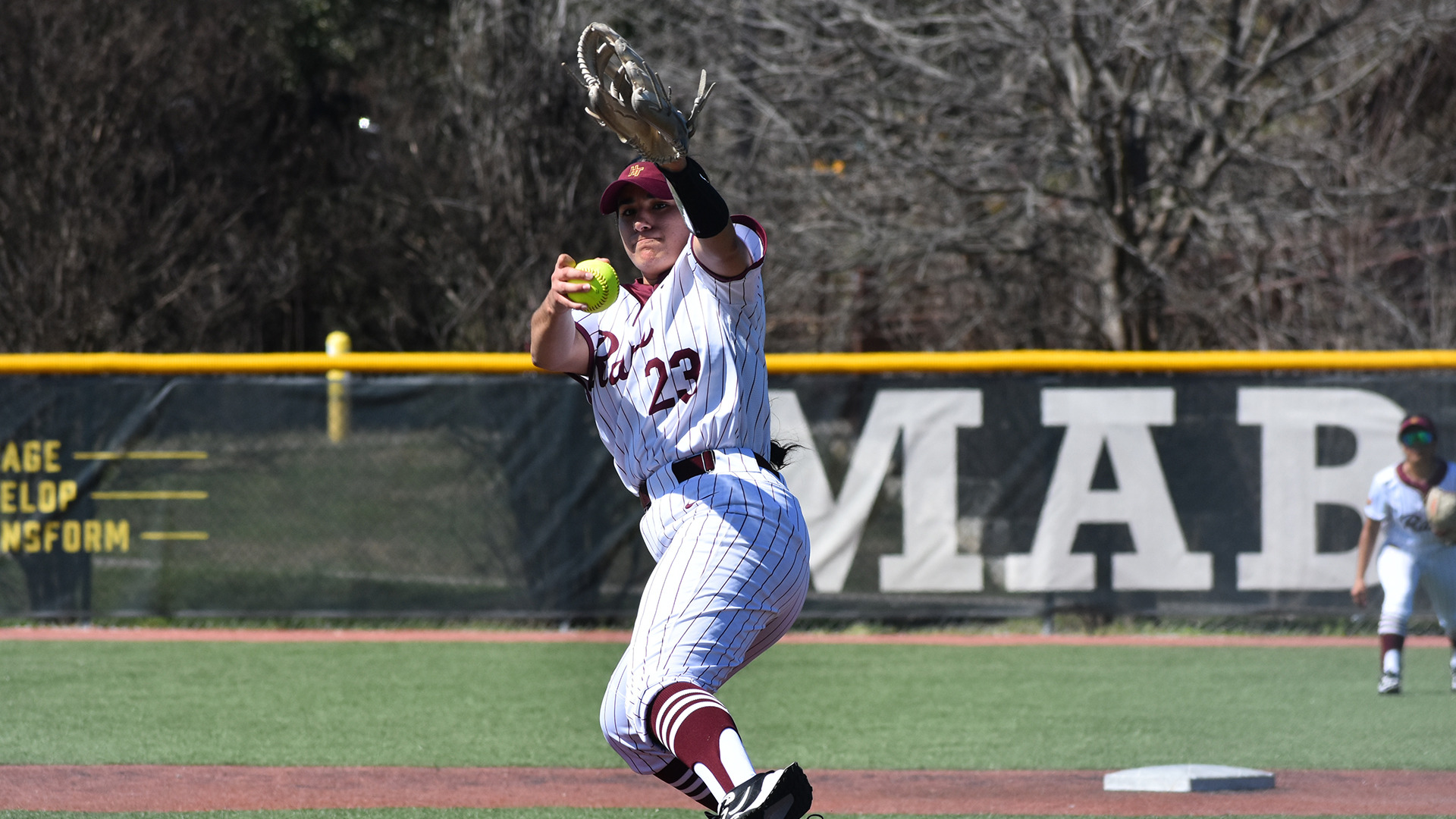 Kayla Camacho winds up to throw a pitch in a game earlier this season