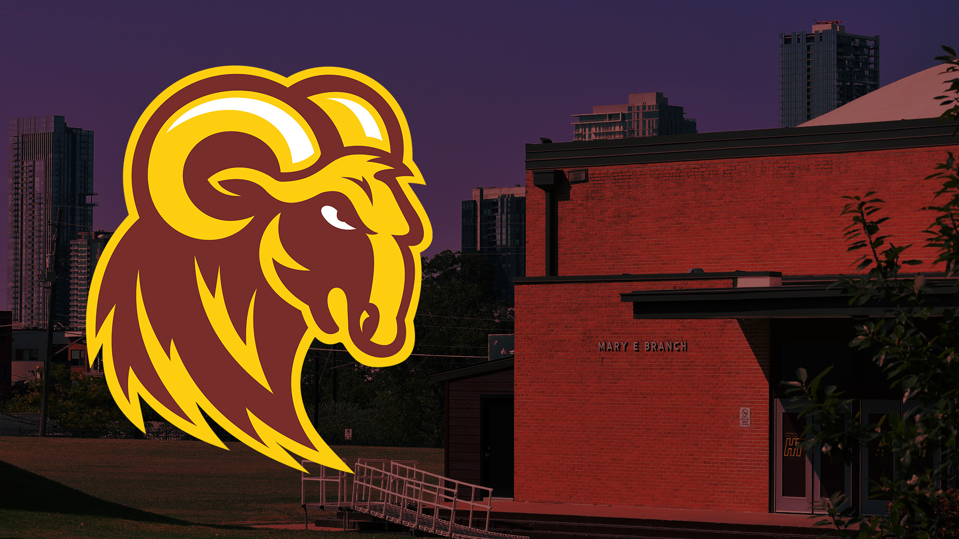 The HT Rams logo in front of a picture of Branch Gymnasium to the right and the Austin skyline in the background. The image (with the exception of the logo) is filtered through a linear burn filter