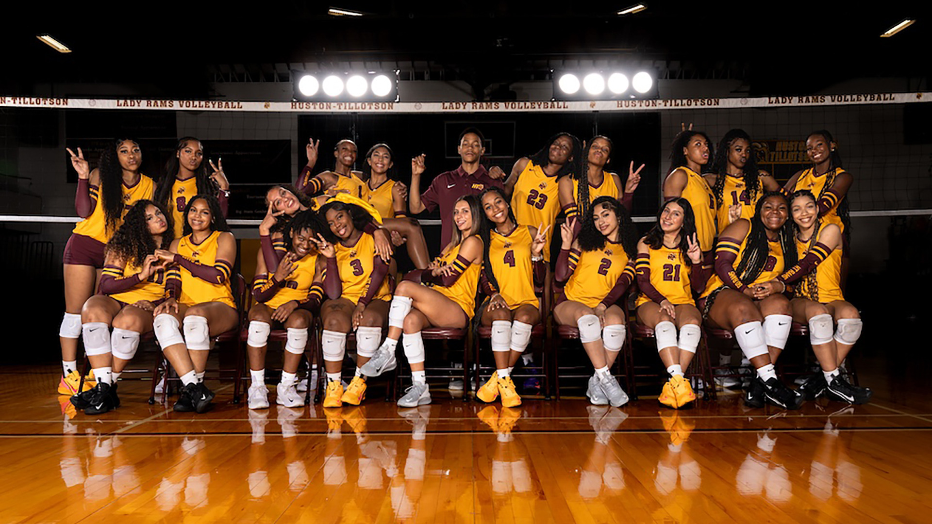 The HT Volleyball team in a group picture making fun poses