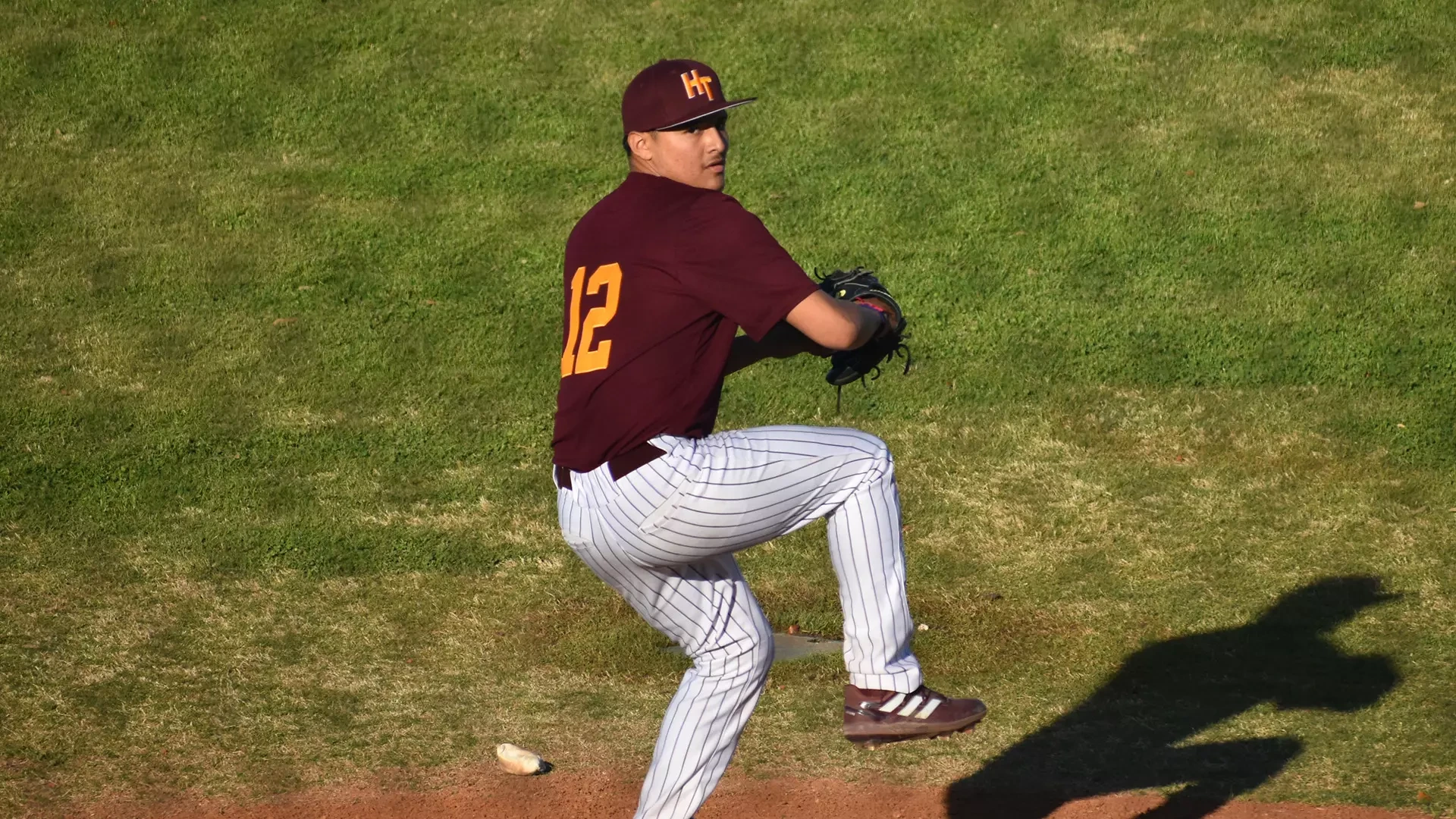 An overhead view of Sam Lozano pitching left-handed in a game during the 2024 season