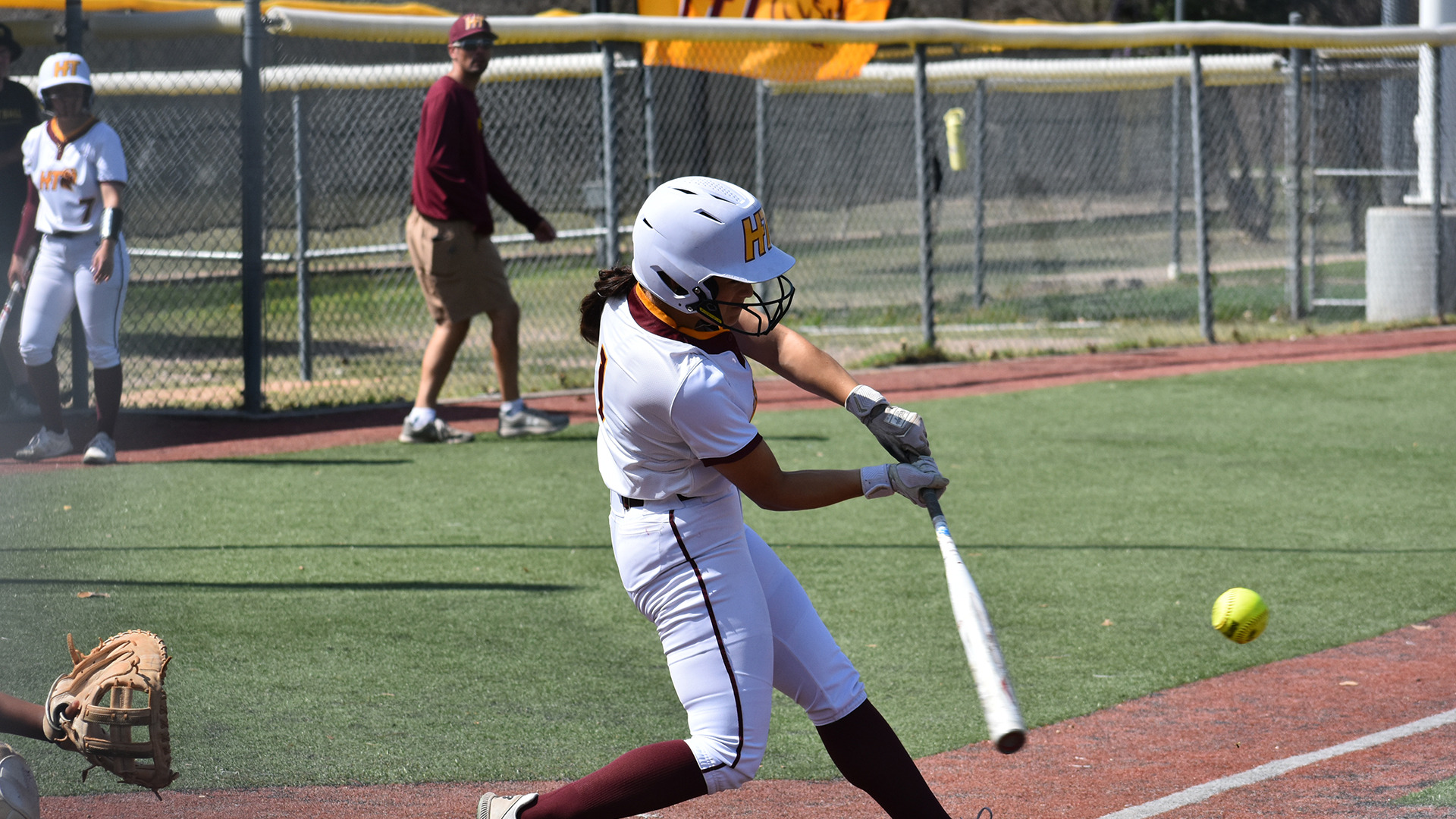 HT softball player Denae Hernandez swings and makes contact with a pitch in the Rams' series finale against Voorhees (S.C.)