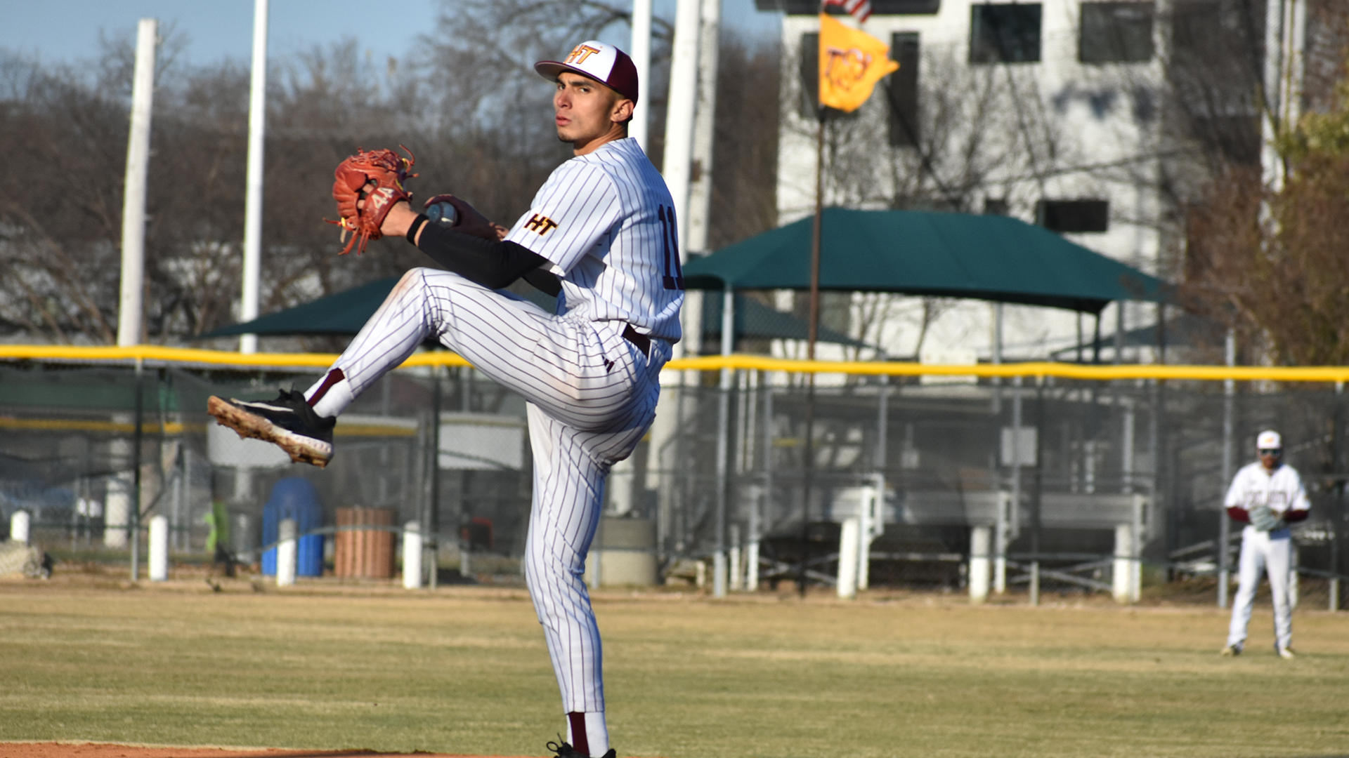 HT baseball relief pitcher Evan Mendoza winds up for a pitch in a game early in the 2026 season