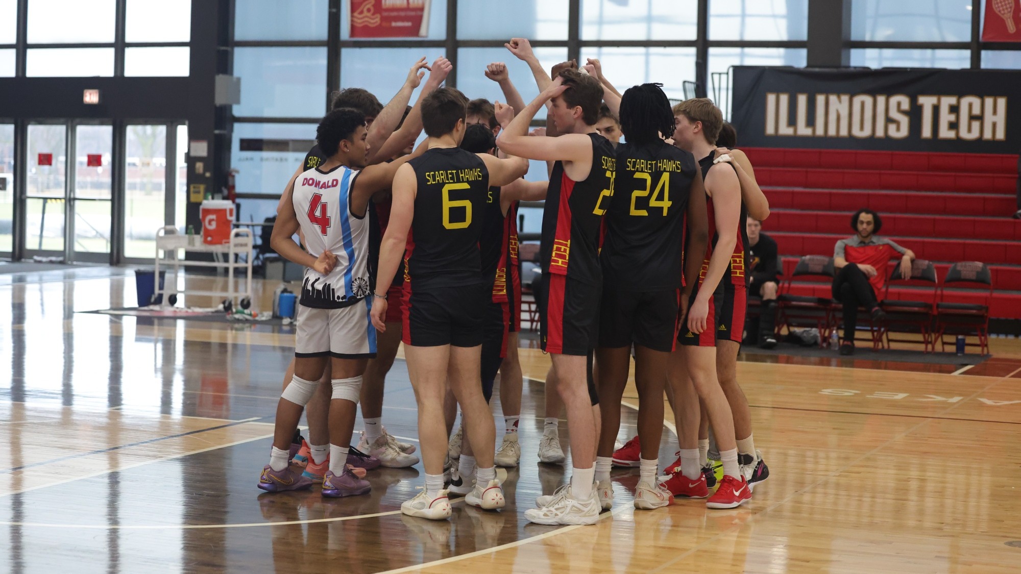 MVB team huddle vs Aurora 3-19-25