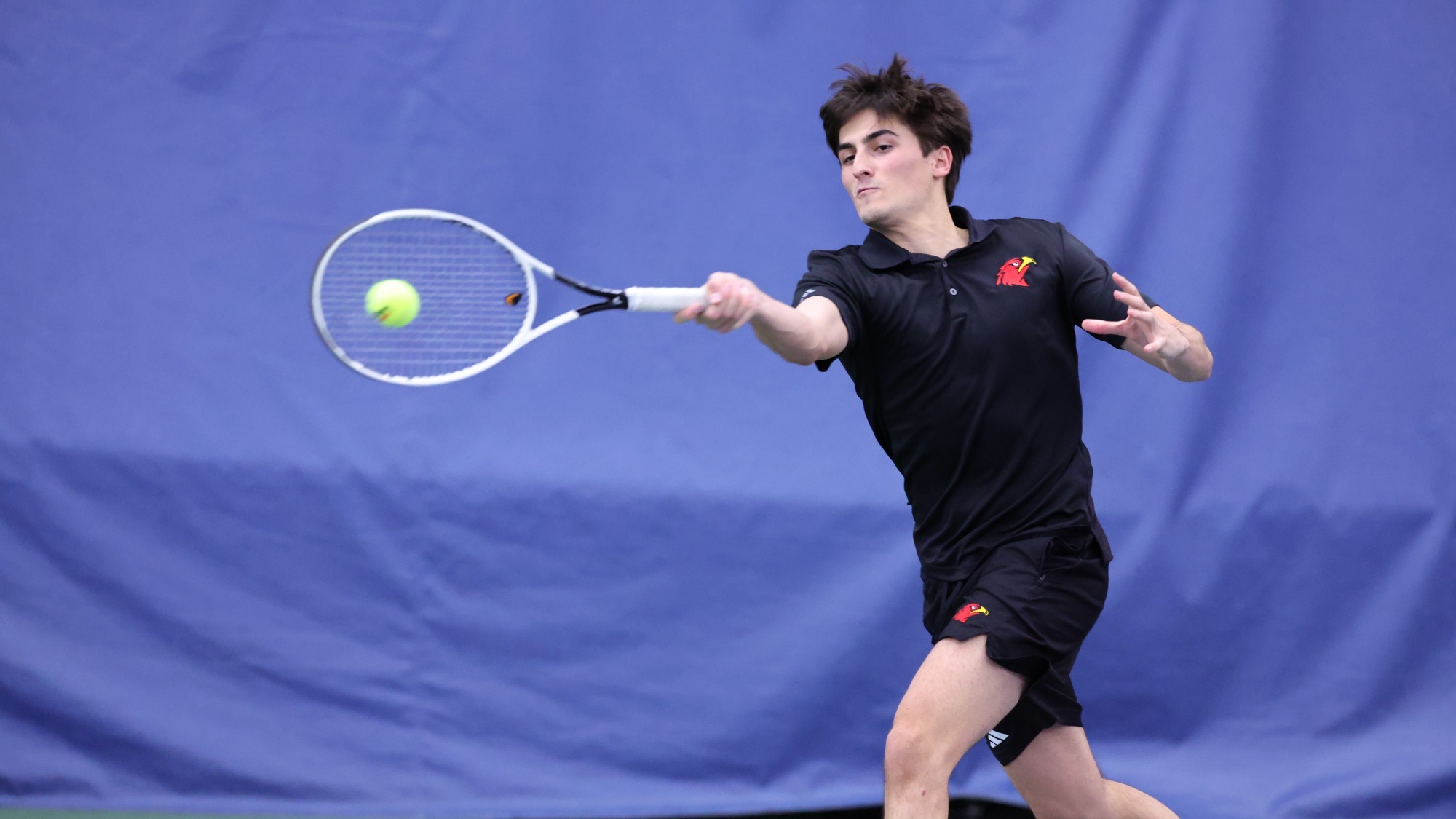 Pedro Roca returning a shot against Greenville 2-6-26