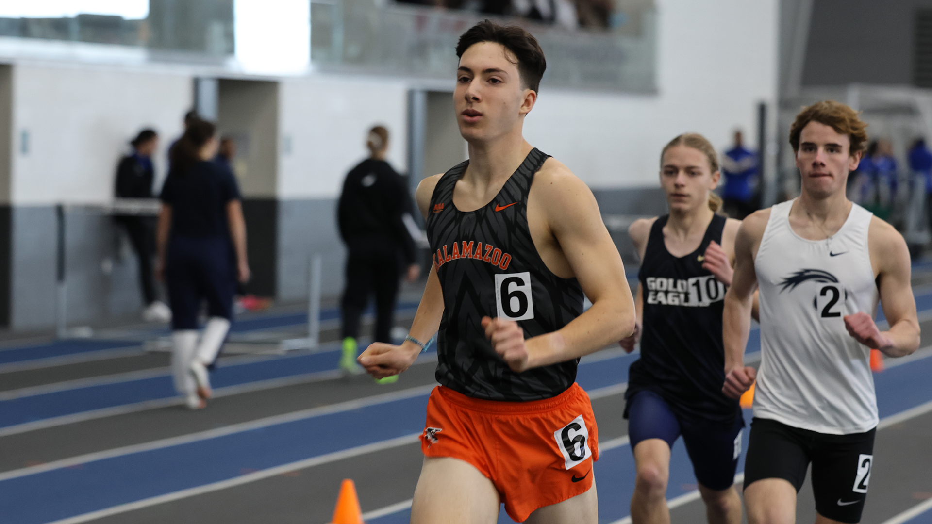 Drew Abbott running indoor track