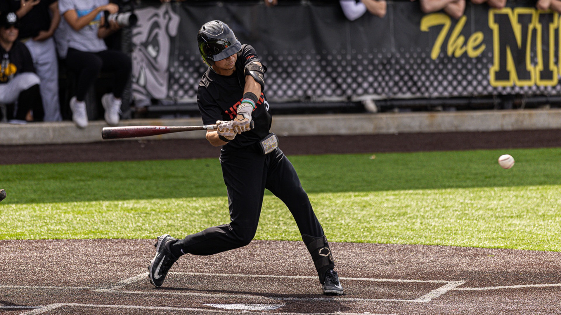 Cooper Mills playing baseball