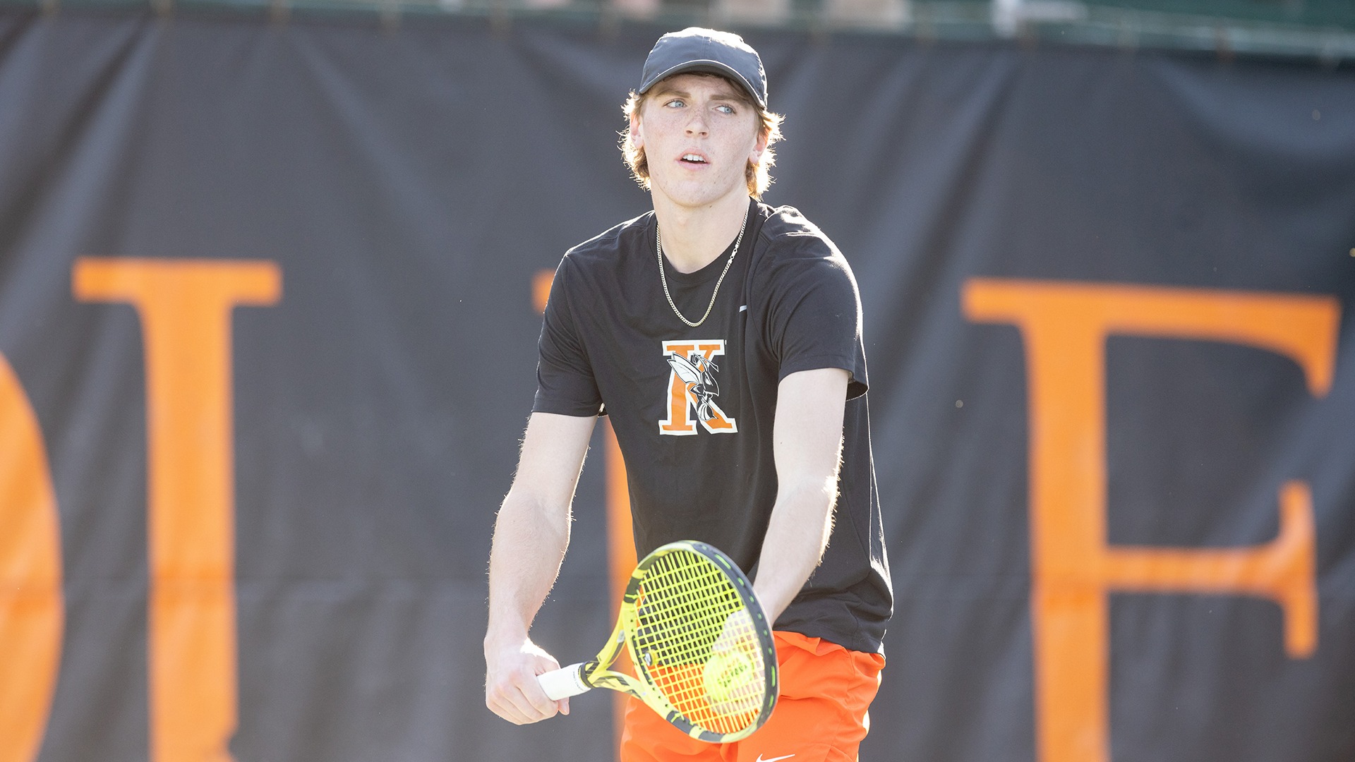 Cameron Crosby playing tennis