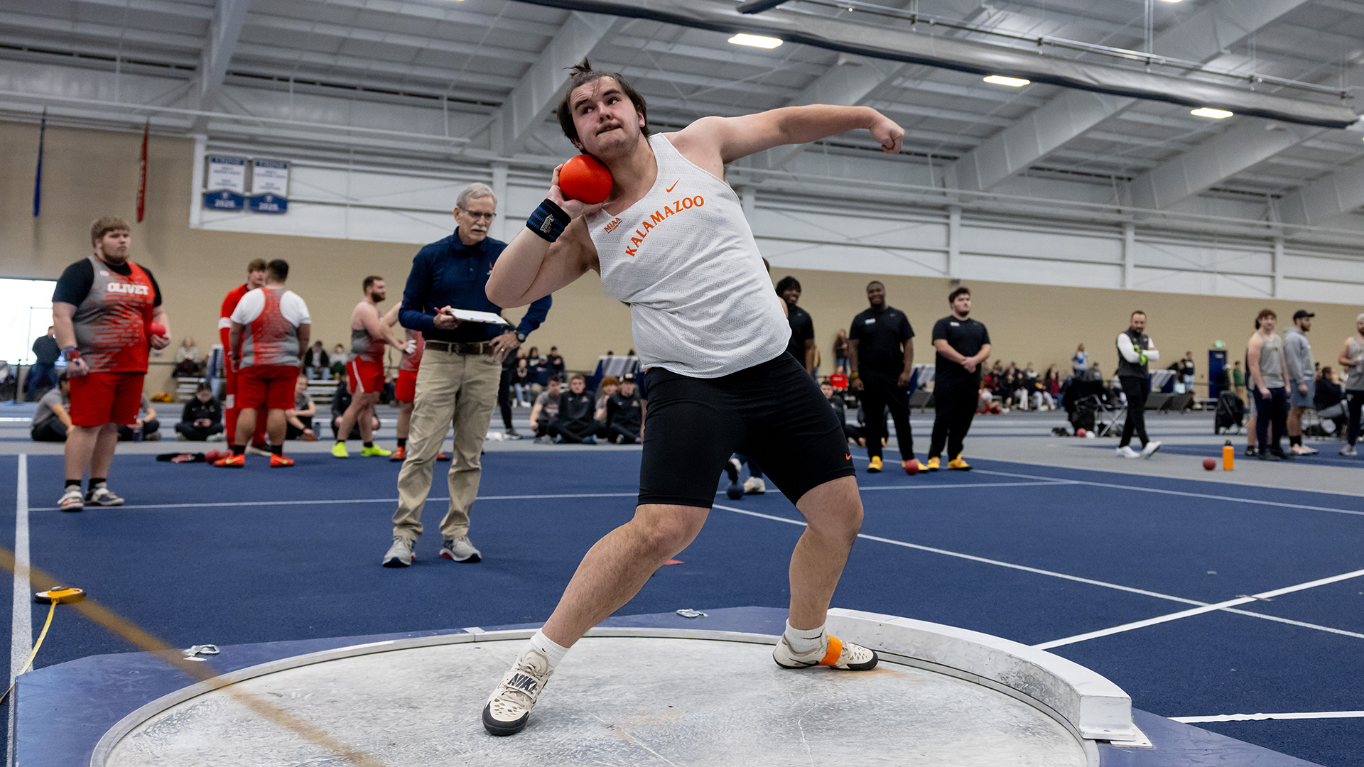 Ethan Romey throwing shotput